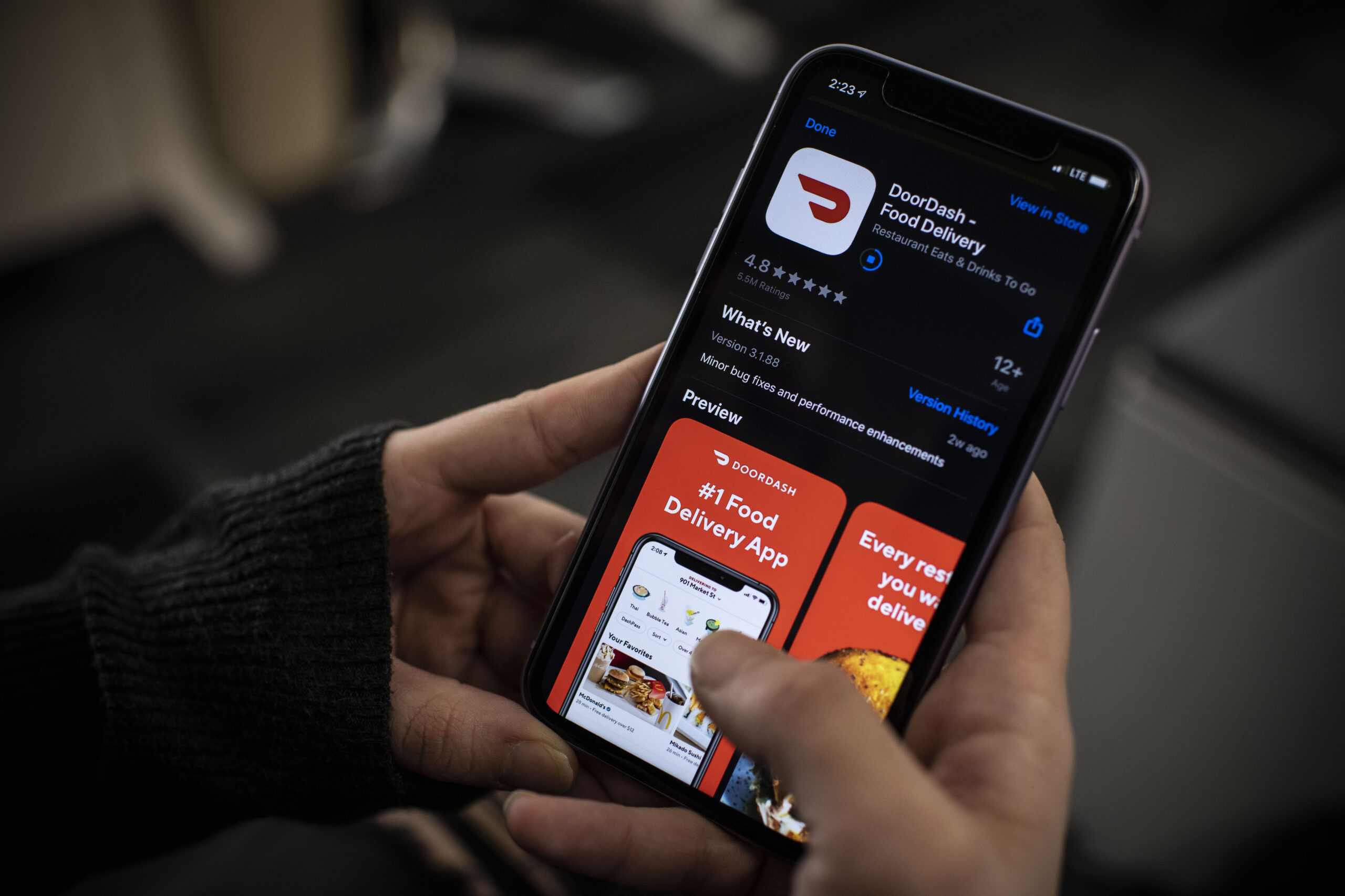A user accesses the DoorDash app on their mobile phone.