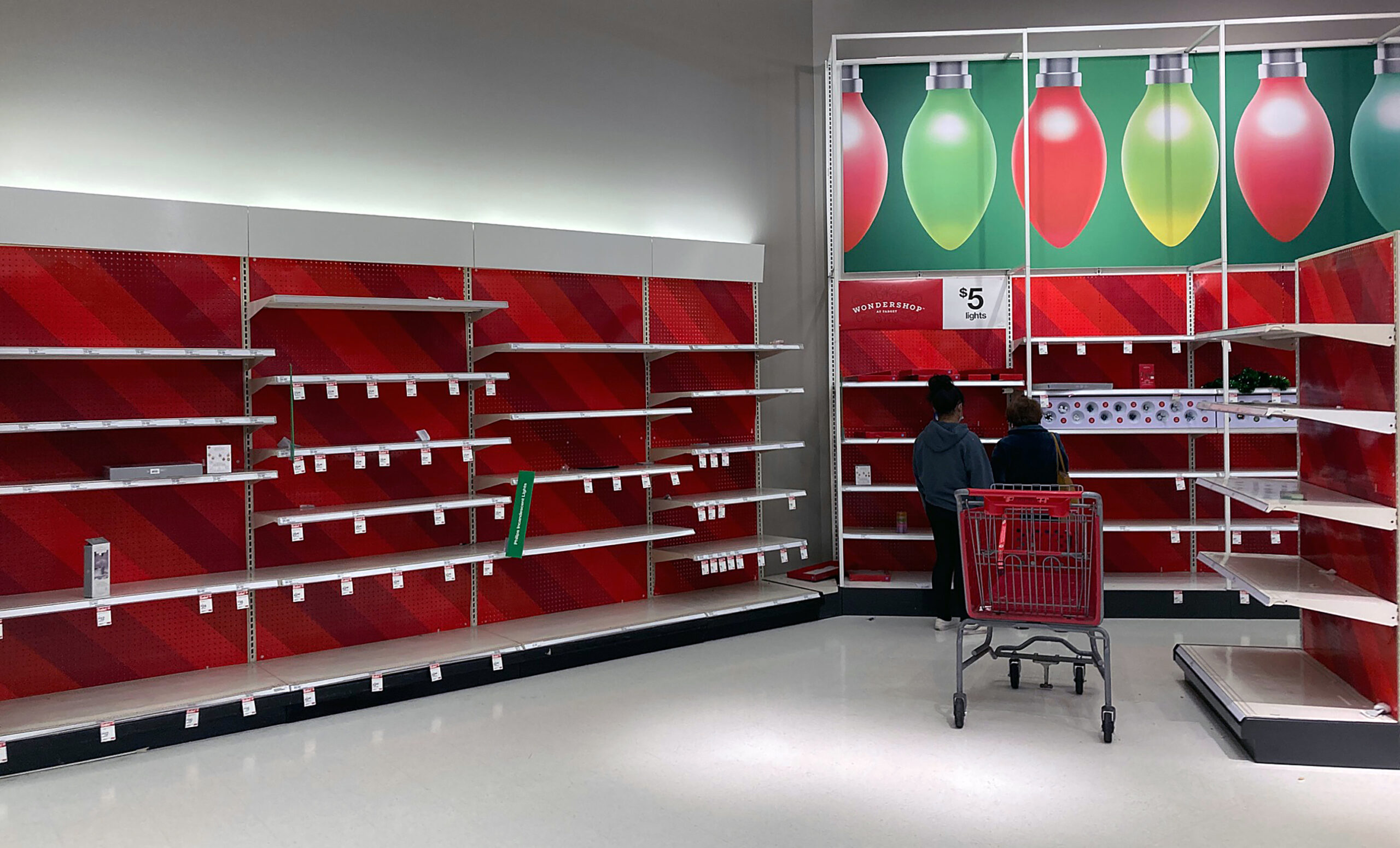 Empty shelves dominate in a Target store.