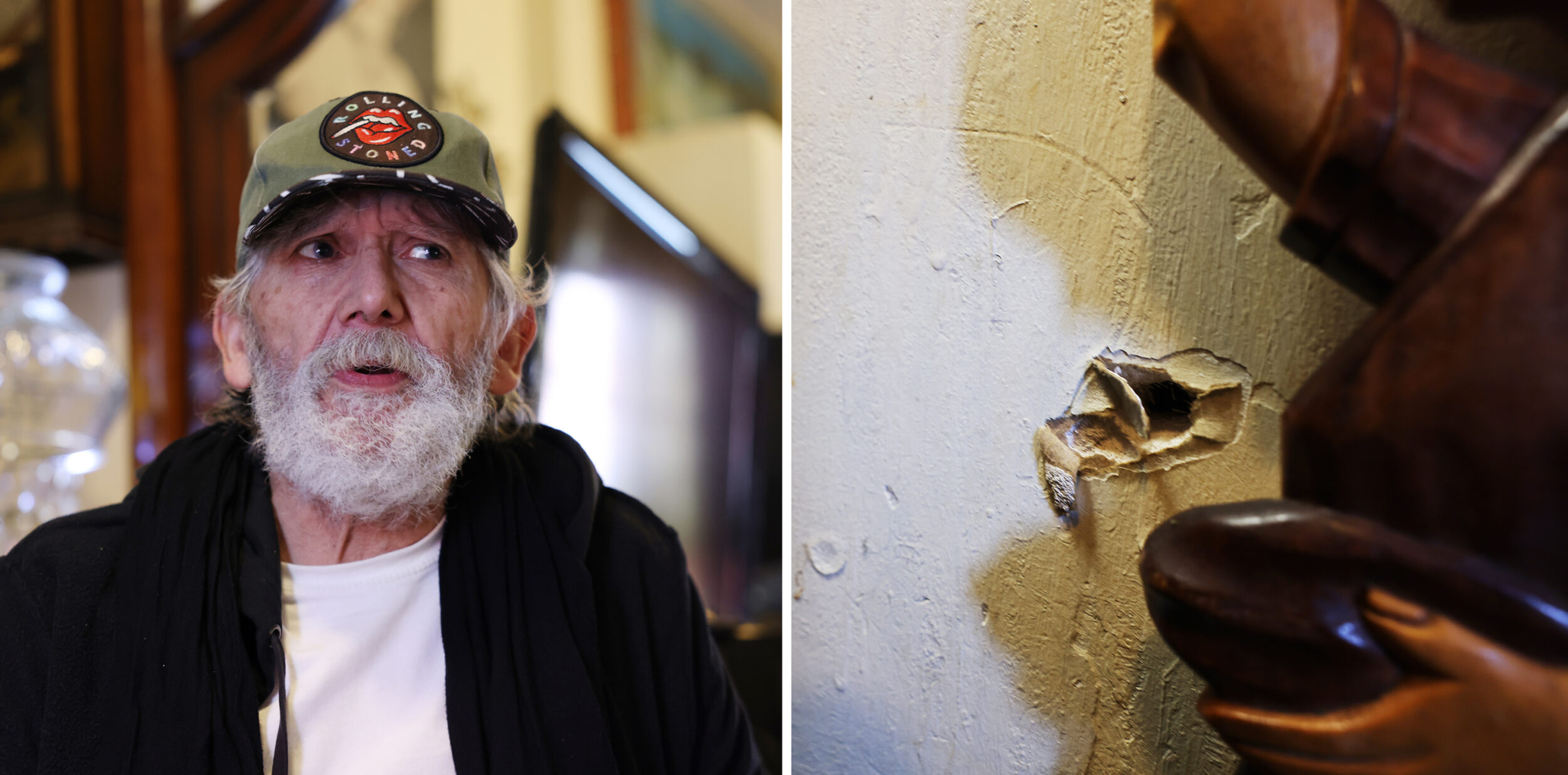 An elderly man in a cap and an image of a damaged wall next to a wooden sculpture's hand.