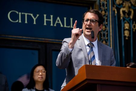 Supervisor Dean Preston calls for the governor and state Legislature to include additional funding for public transportation in the annual budget during a press conference at San Francisco City Hall on April 18, 2023. | Justin Katigbak for The Standard