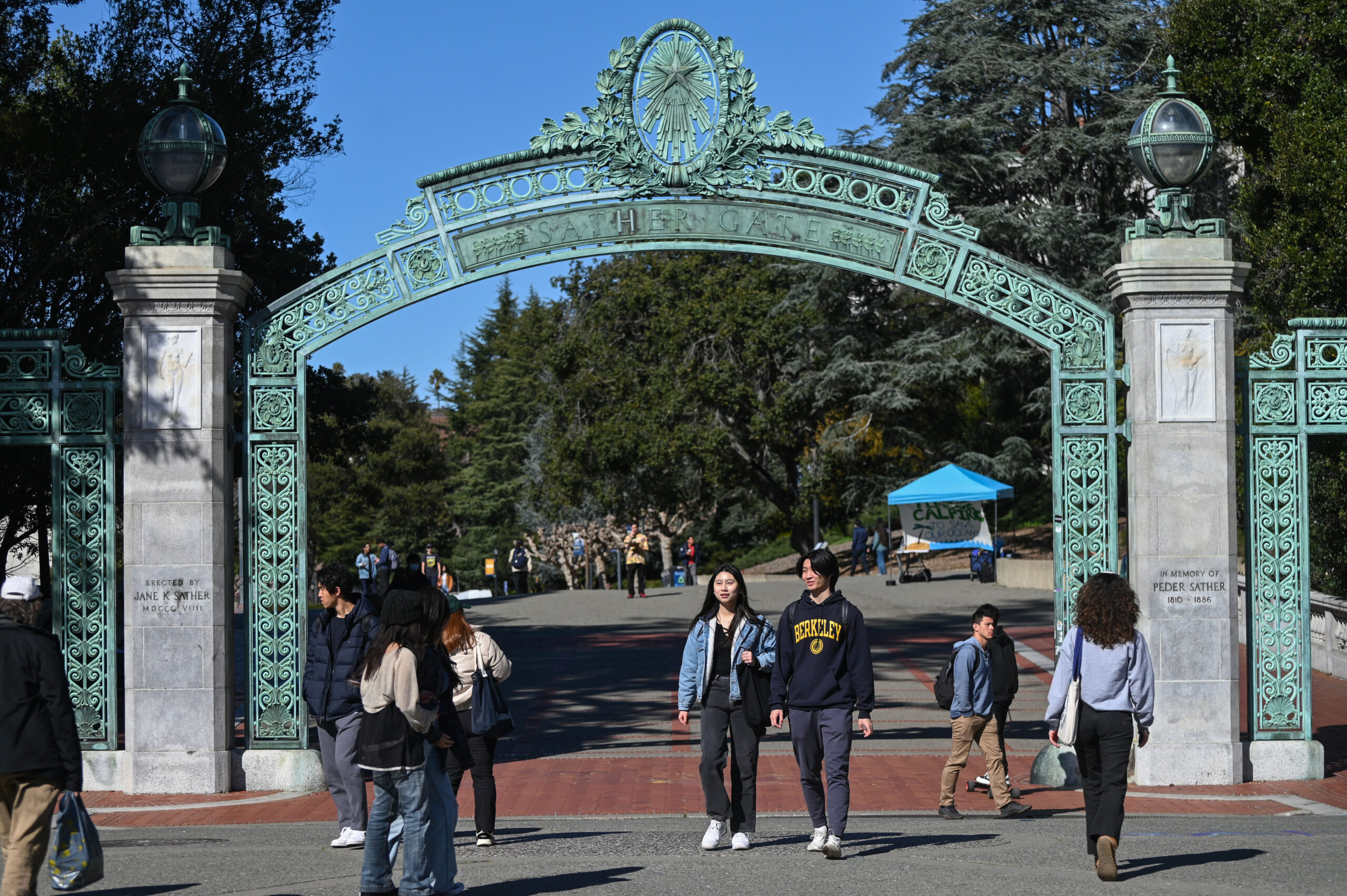 Students walk through Sather Gate at UC Berkeley on Feb. 15, 2023. | Samantha Laurey for The Standard