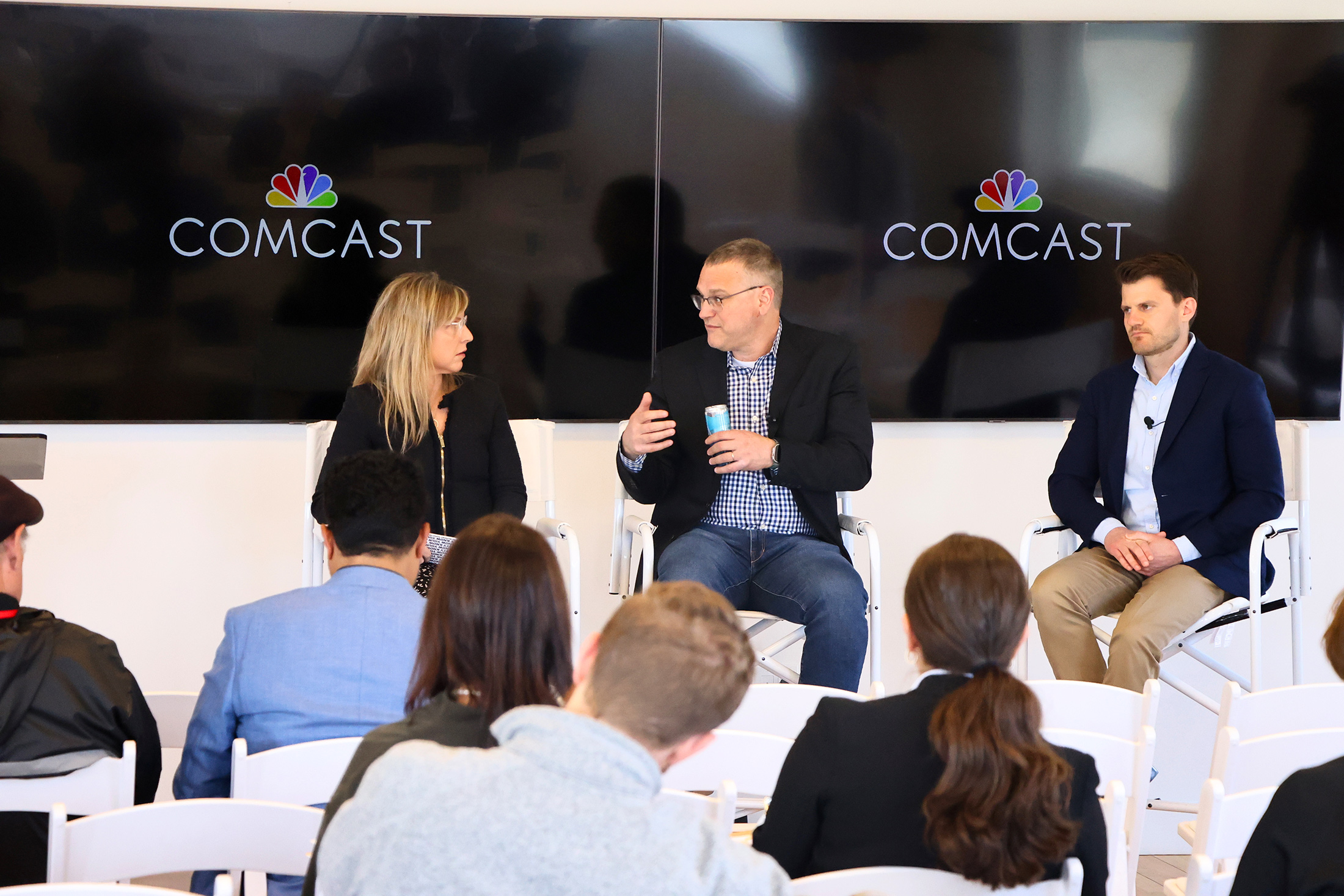 The Standard's editor-in-chief Julie Makinen moderates a panel discussion with Elad Nafshi, chief network officer for Comcast, and Jeff Bellisario, executive director for the Bay Area Council's Economic Institute