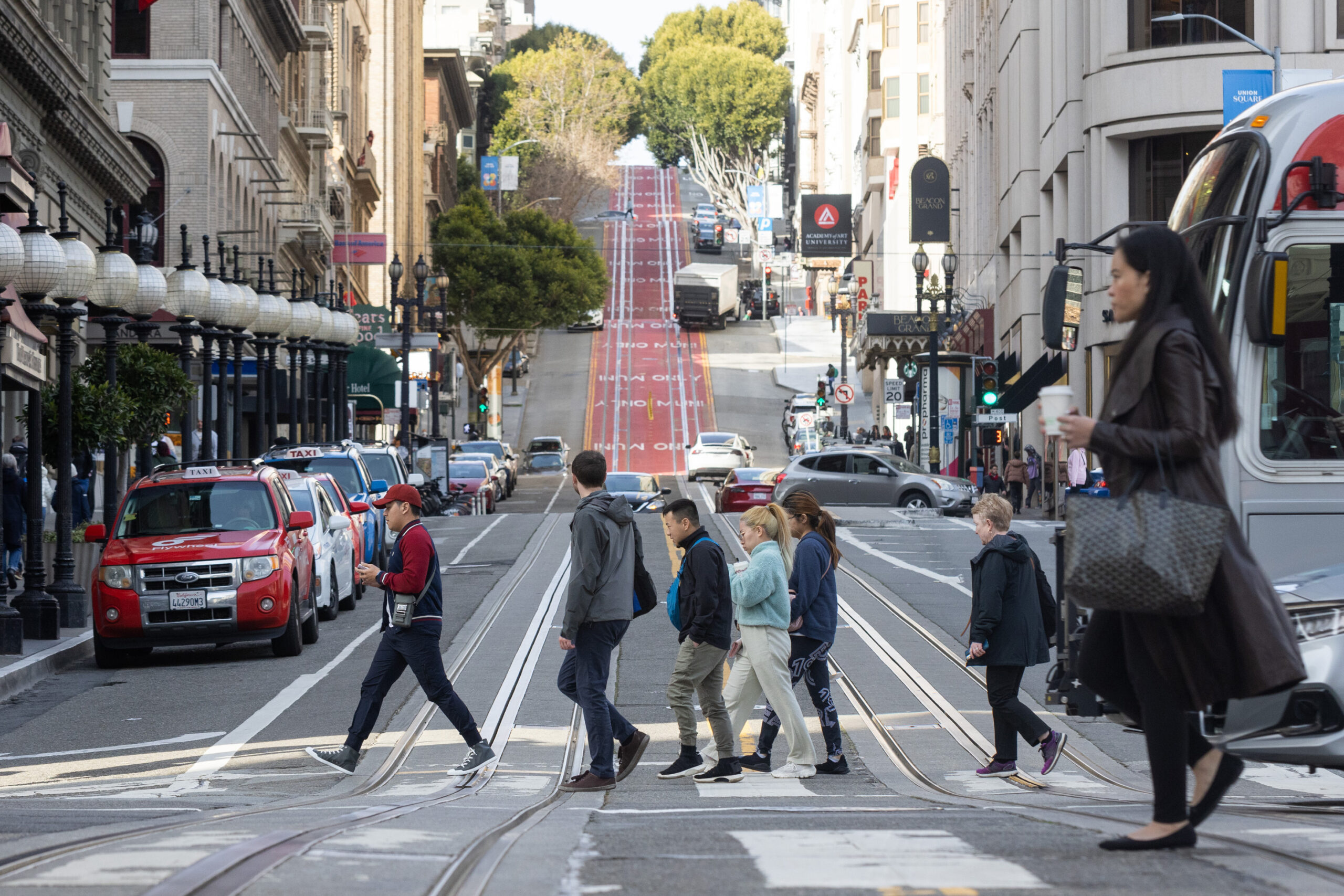 Pedestrians walk in San Francisco