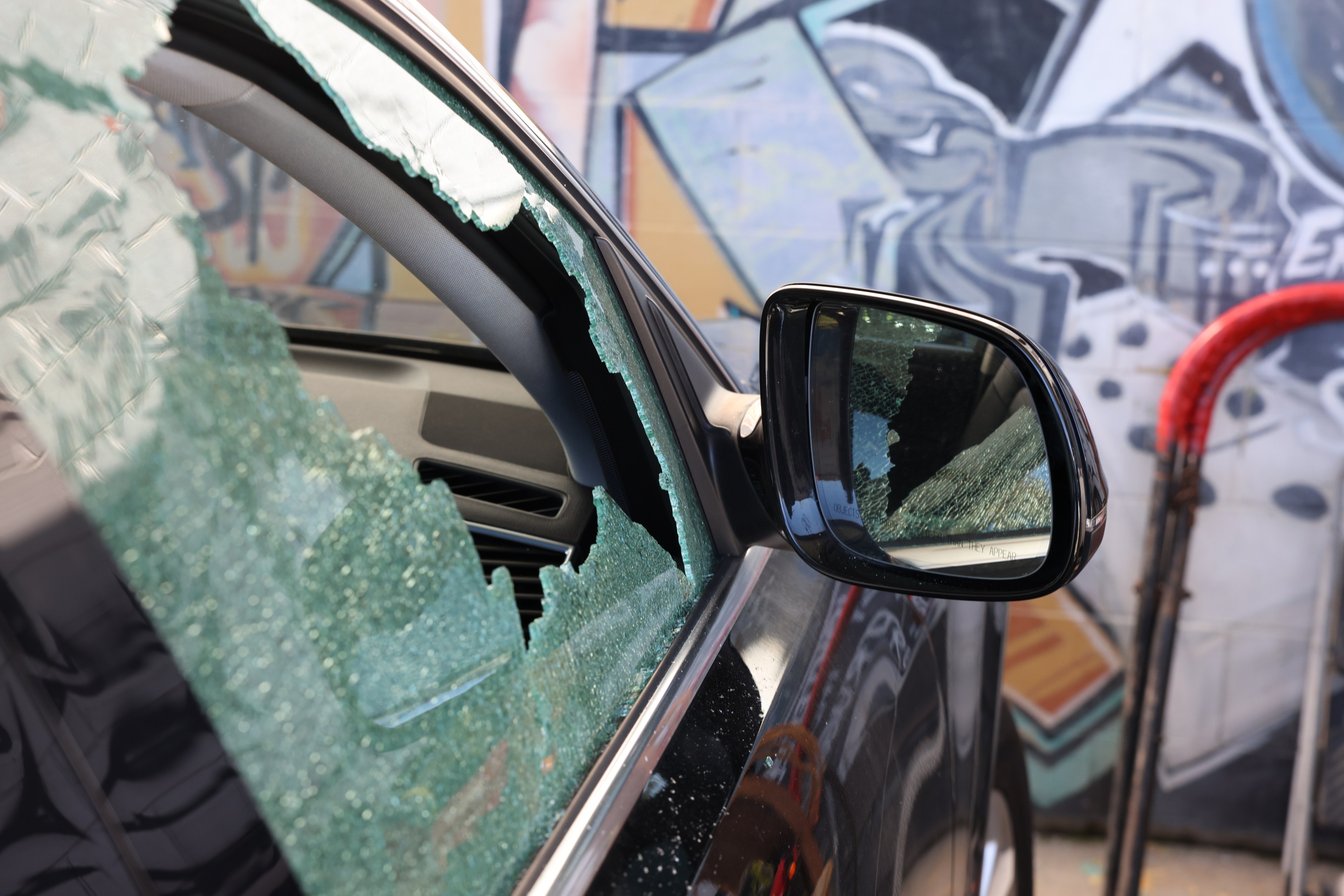 A car window smashed.