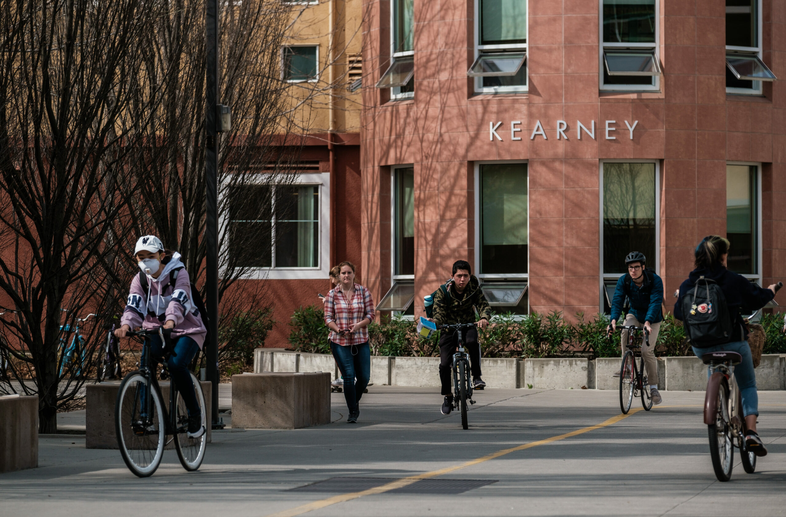 Students cycle on the campus of UC Davis. | Nick Otto/Washington Post via Getty Images