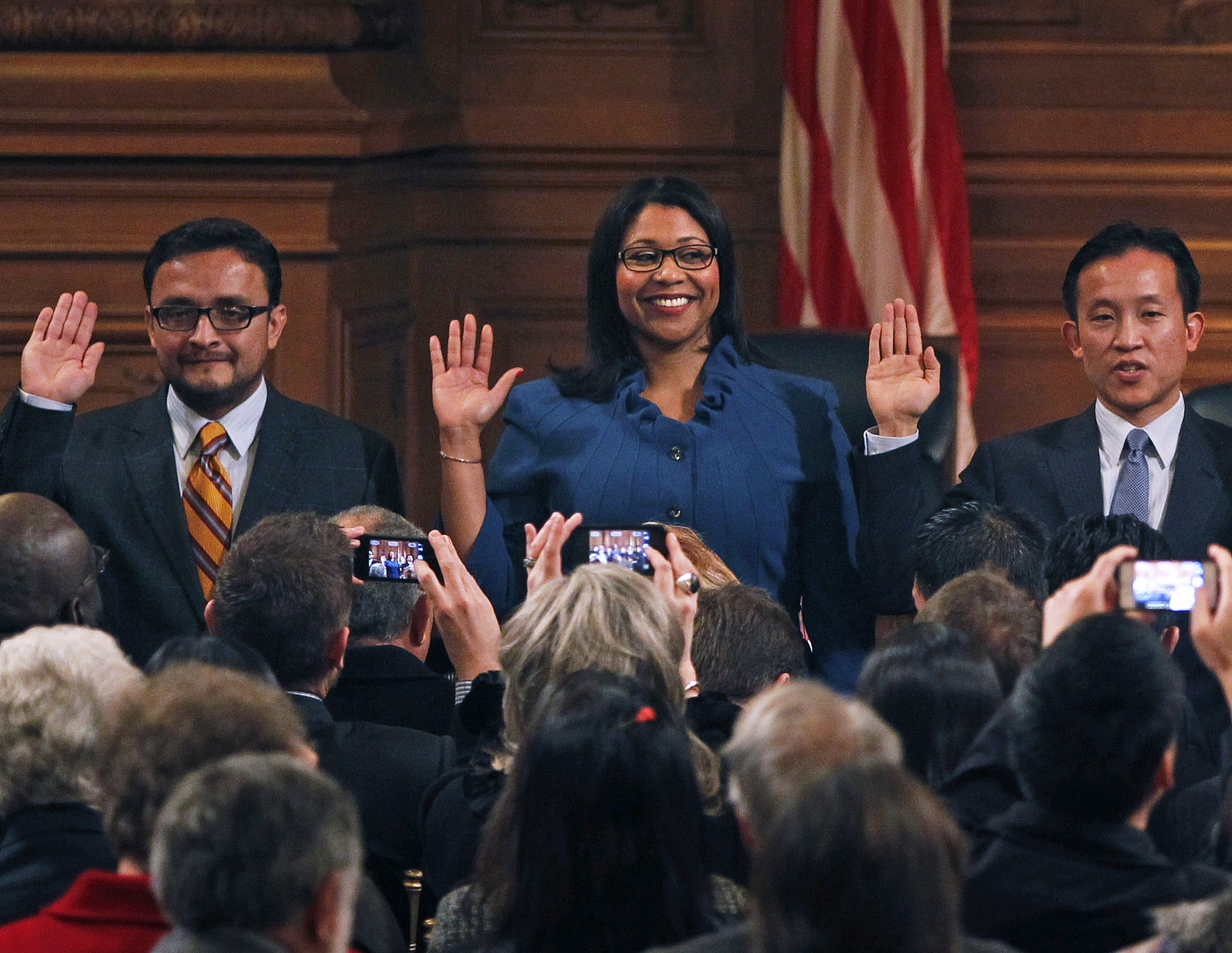 David Campos, London Breed and David Chiu (from left to right) take the oath of office during the supervisors' swearing-in ceremony at San Francisco City Hall on Jan. 8, 2013.
