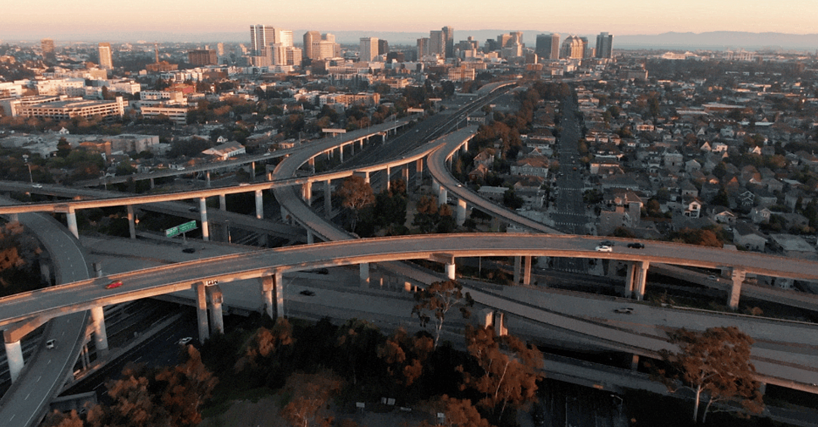A aerial drone video of cars driving along the highway at the the 24-580-980 Interchange in Oakland. | Adobe Stock