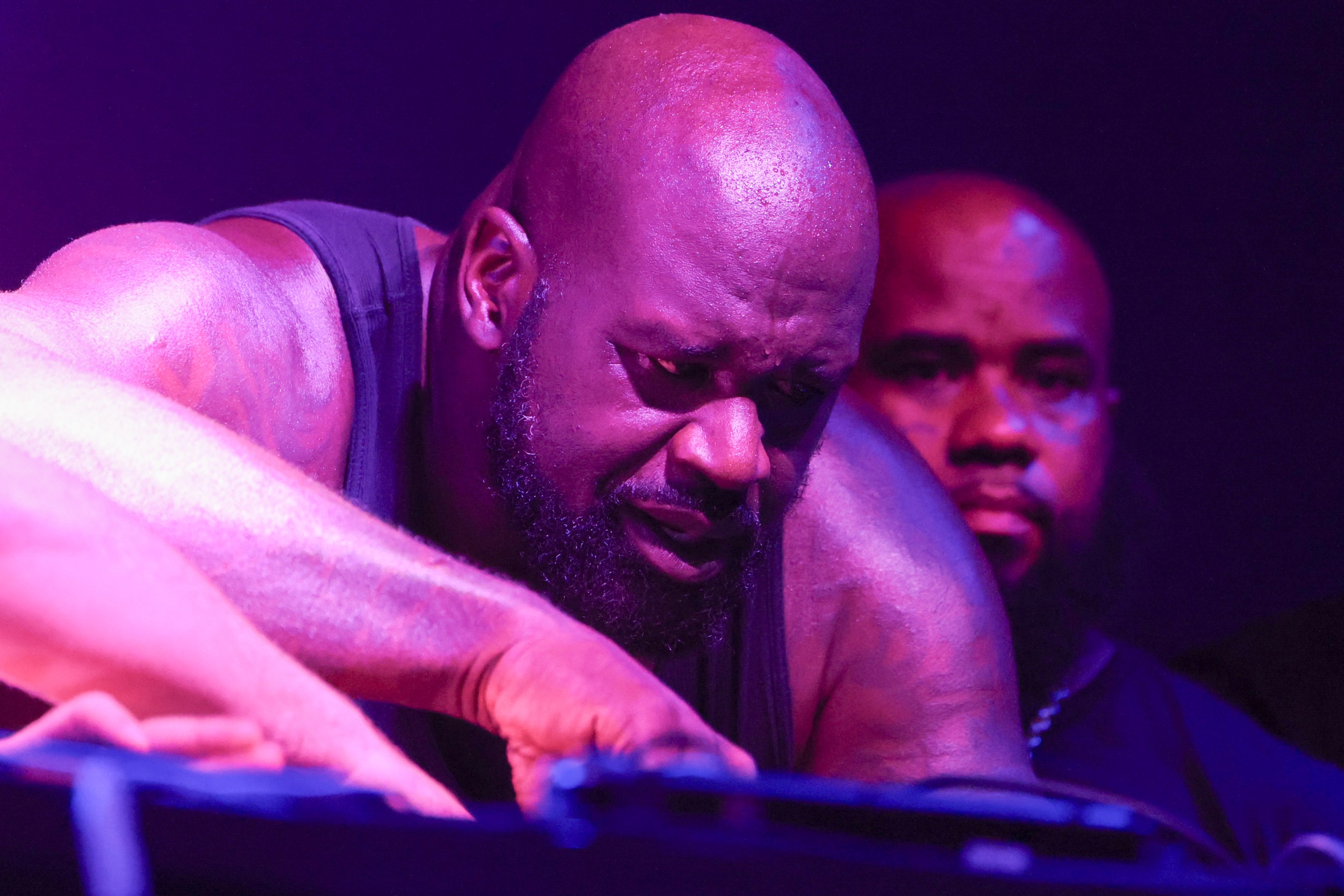 DJ Diesel, aka Shaquille O’Neal, focuses as he performs at 1015 Folsom on Friday.