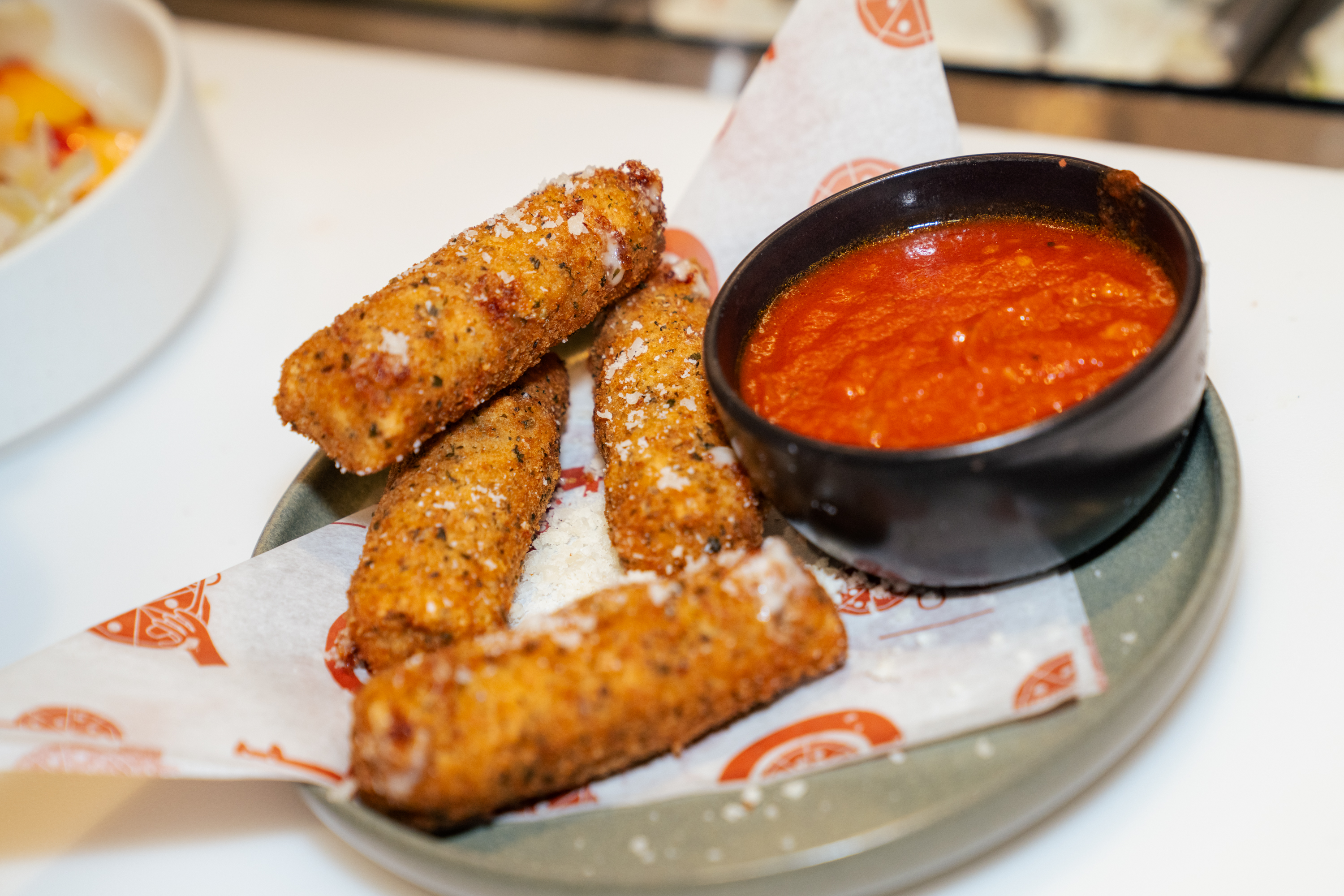 Fresh mozzarella sticks are a standout item on the sides menu at Flour + Water Pizzeria and required hours of research to meet the high standards of Pollnow and McNaughton.