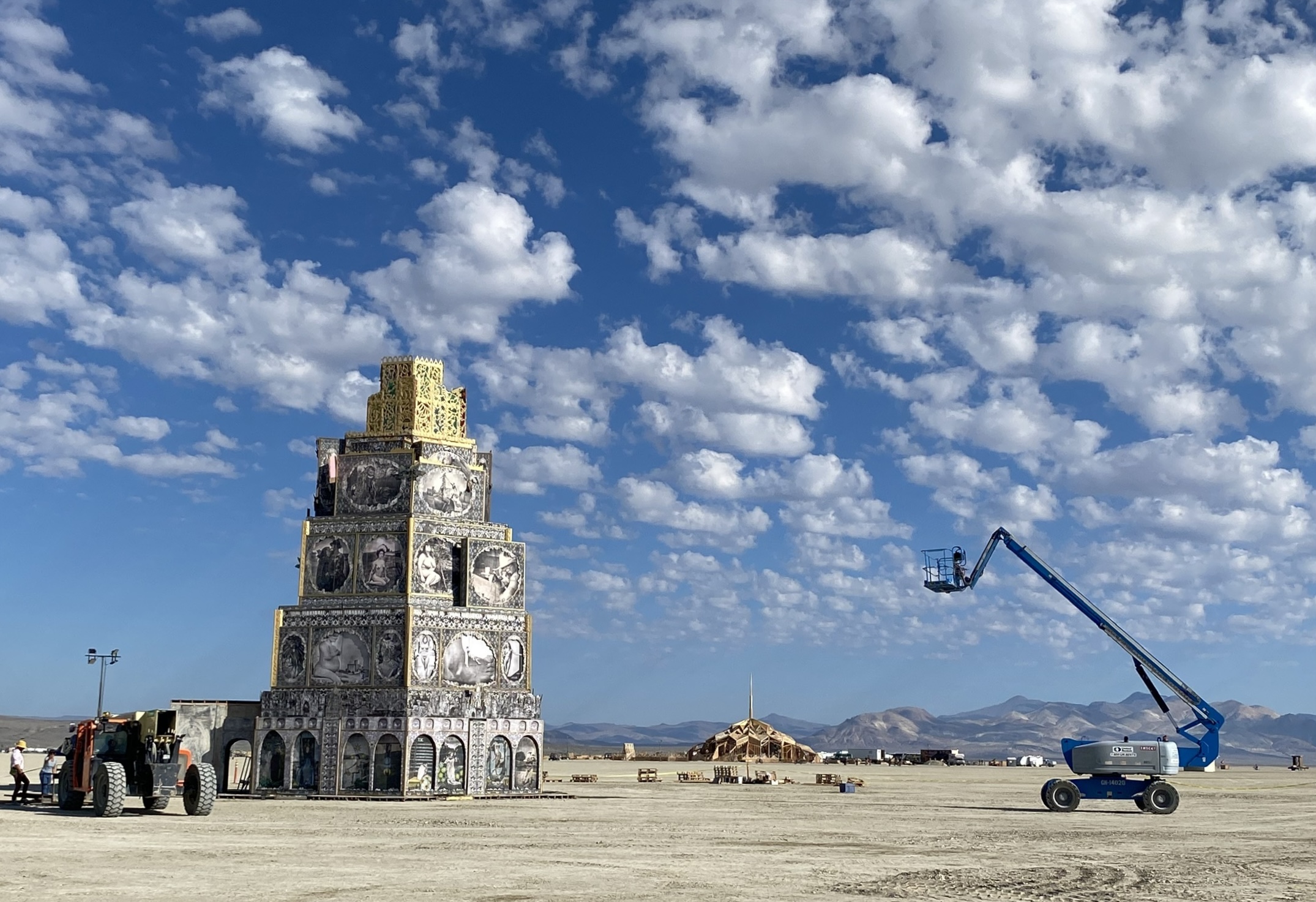 Crews construct the “Chapel of Babel” ahead of Burning Man 2023. As of Thursday, Aug. 24, 2023, its crews appeared to be reaching the “finishing touch” stages of longtime Burning Man artist Michael Garlington’s final sculpture for the playa.