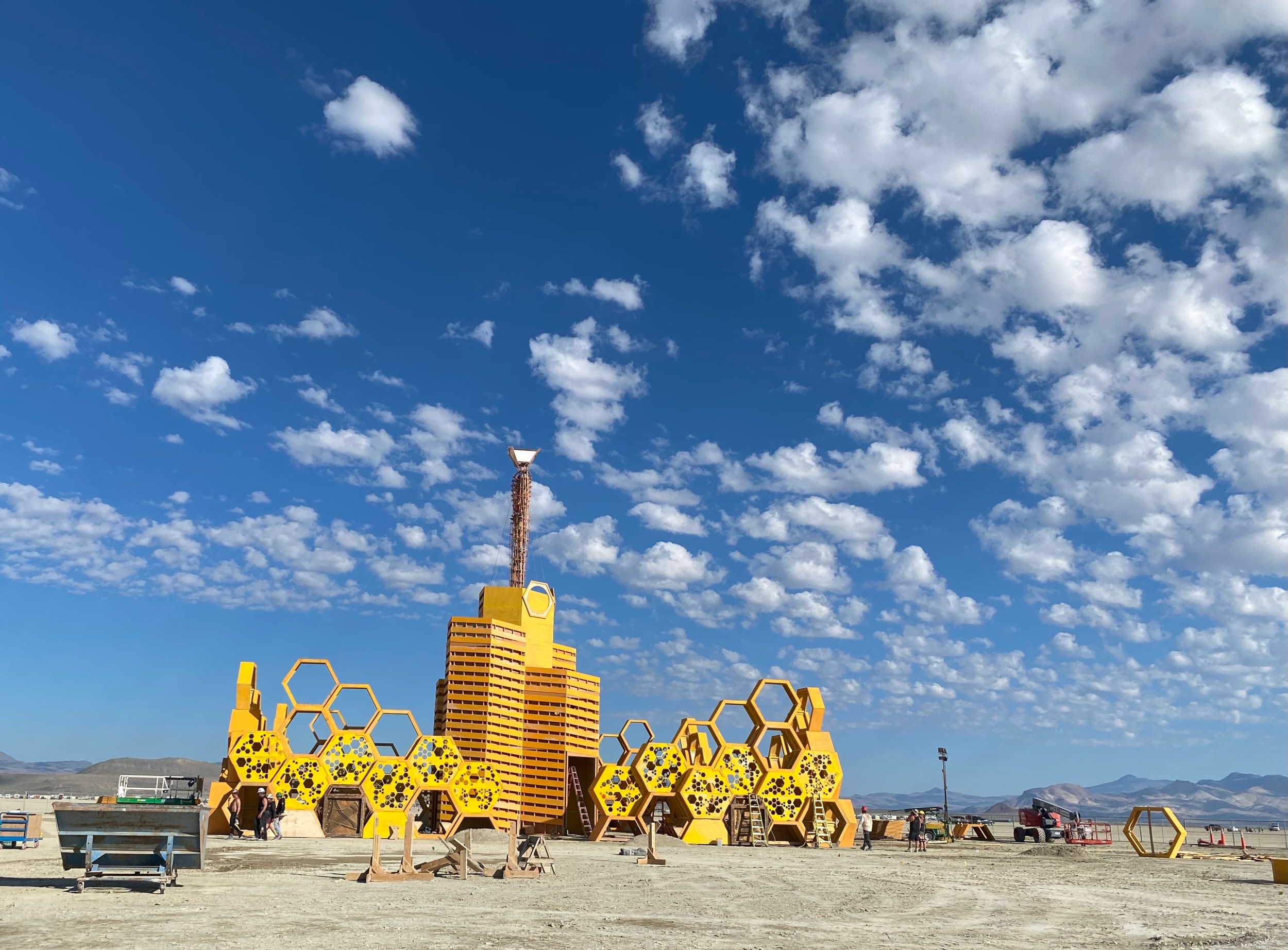 Honeycomb structures surround the base of &quot;The Hive&quot; at Burning Man 2023 in the Nevada desert.