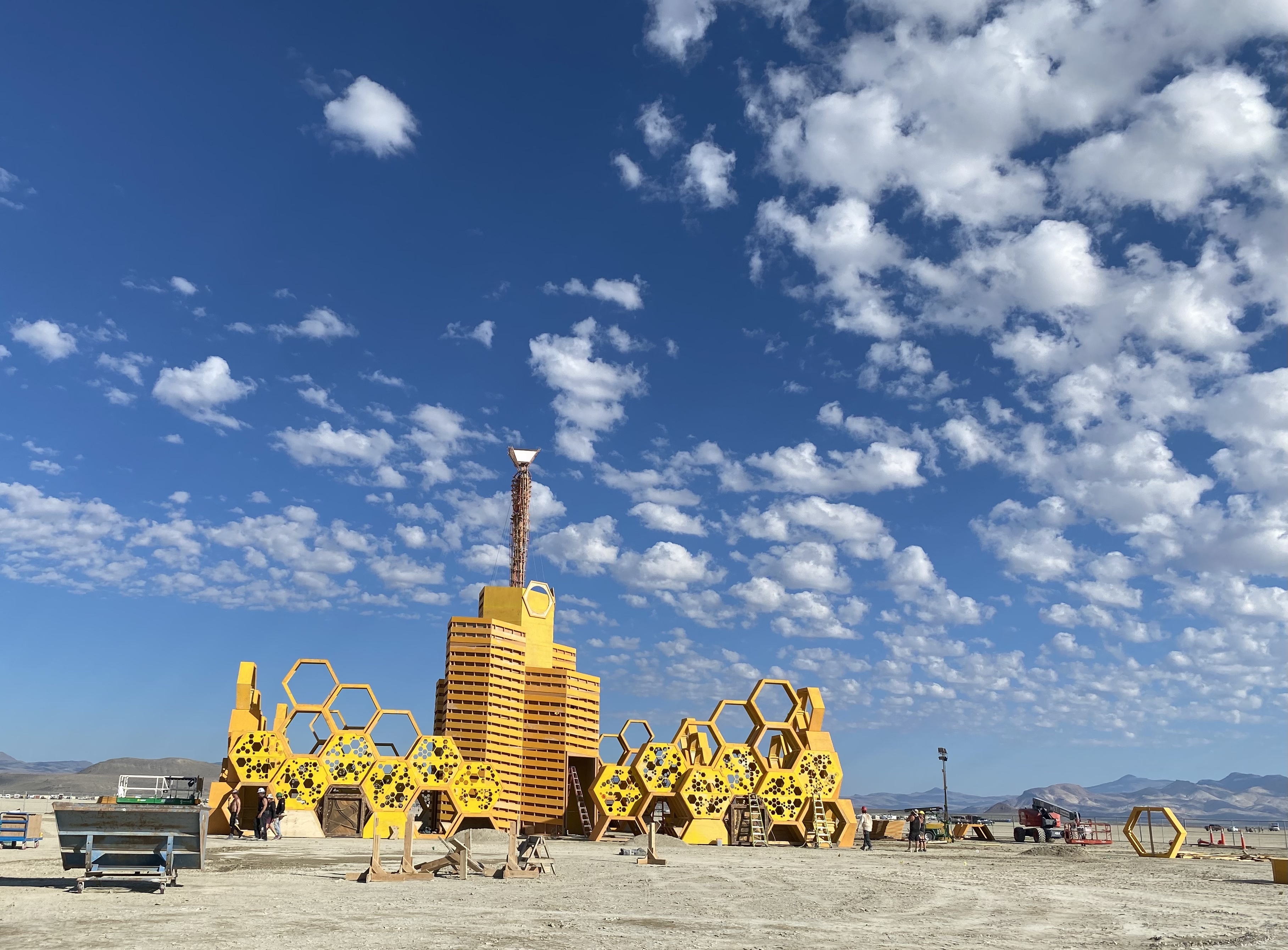 Honeycomb structures surround the base of &quot;The Hive&quot; at Burning Man 2023 in the Nevada desert.