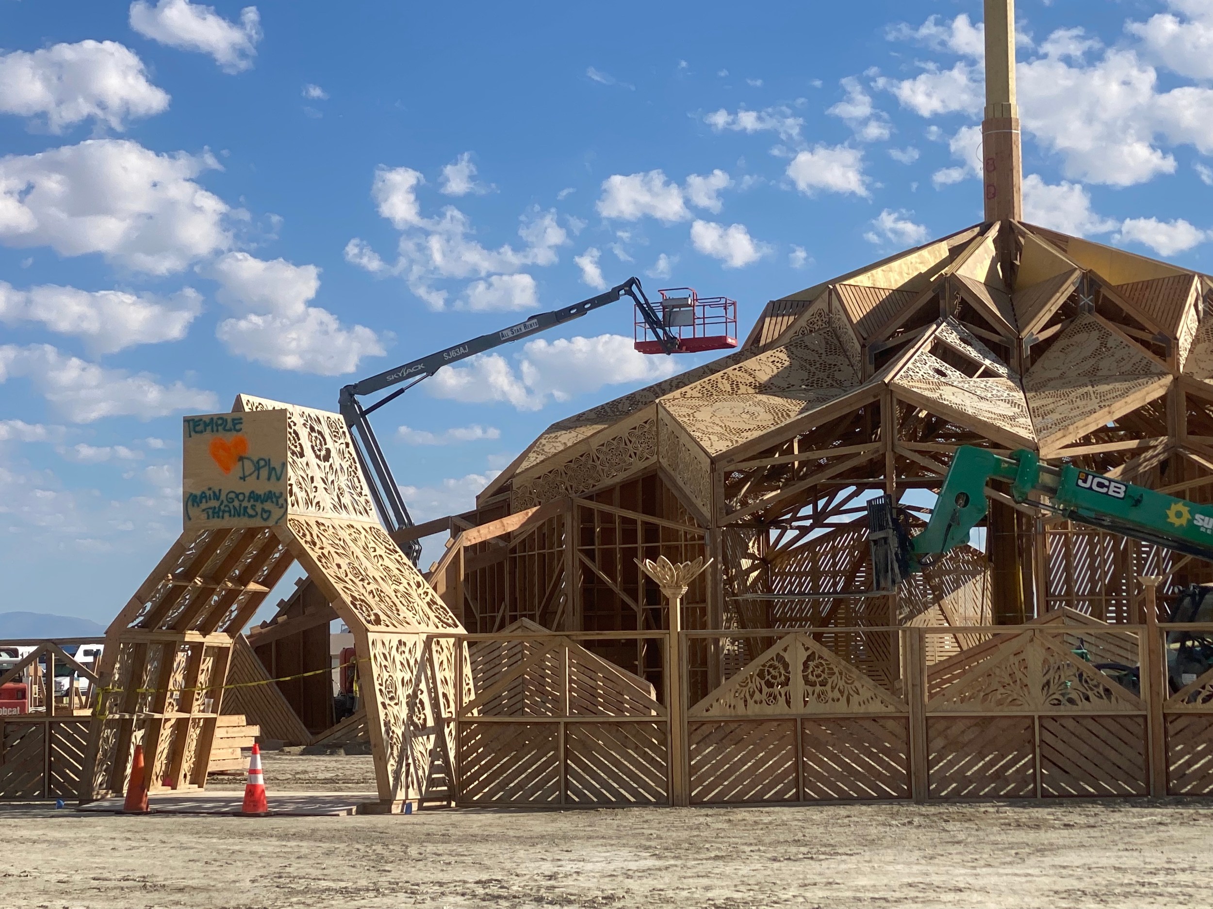 Workers assemble the “Temple of the Heart,” Burning Man 2023's sacred space. It was designed by artists Ela Madej, a San Francisco-based 11-year veteran of the Burn, and Reed Finlay, an architect from Ojai, California.