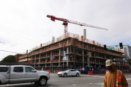 A corner view of a large multi-story construction project.