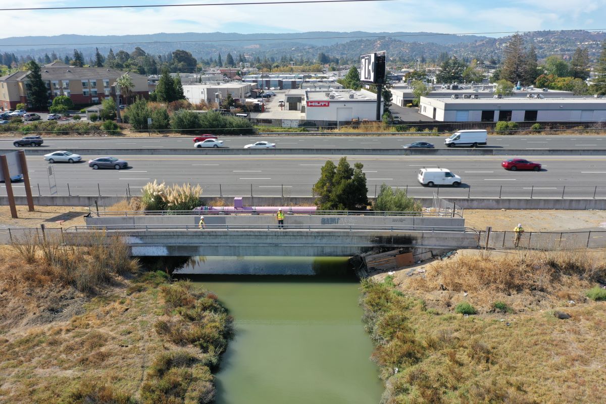 An aerial view shows the Cordilleras Creek Bridge over Highway 101 in Redwood City.