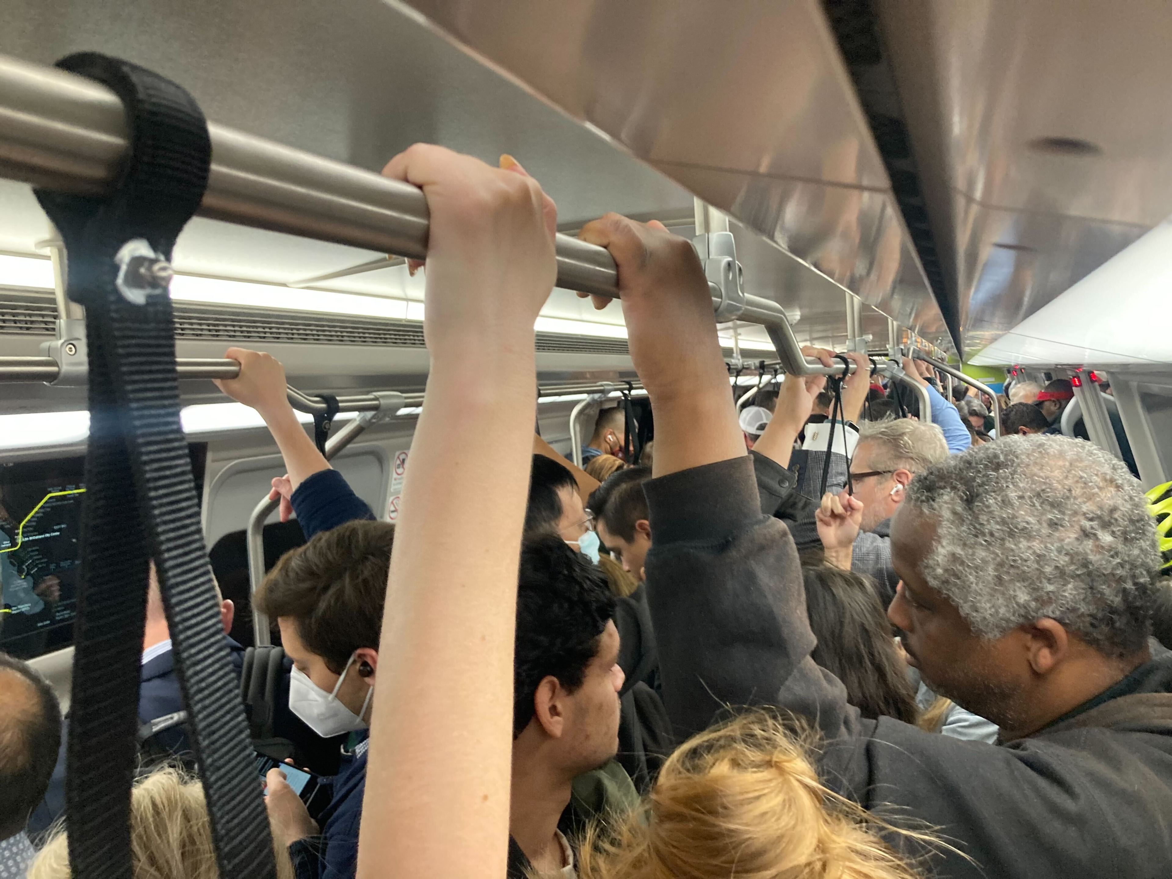 Passengers ride a packed SFO bound train in Oakland on Tuesday, September 12, 2023. Recently, a mysterious odor is annoying commuters on San Francisco-bound trains.