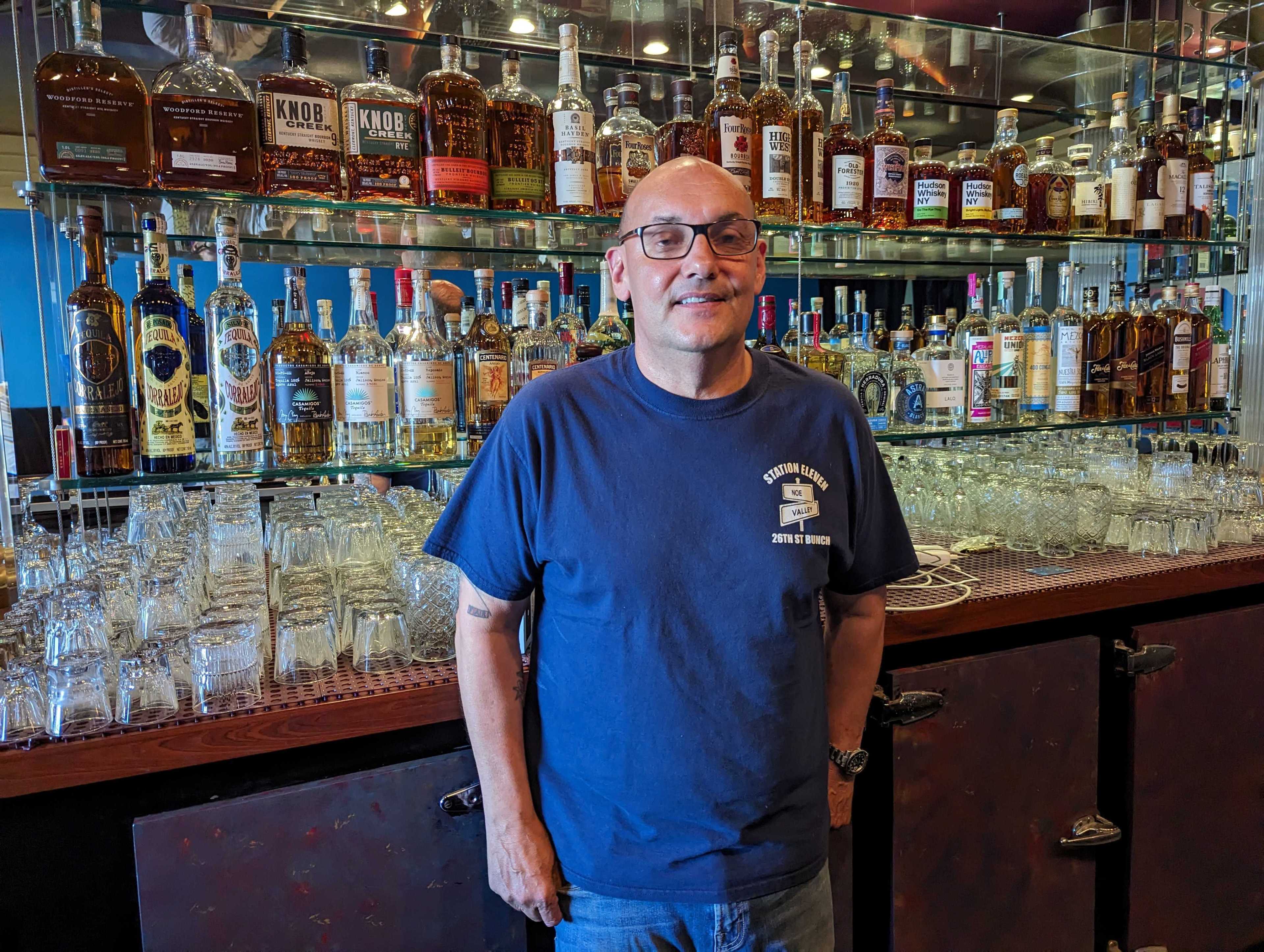 Jeremy Paz stands behind the bar at his soon-to-open venue.