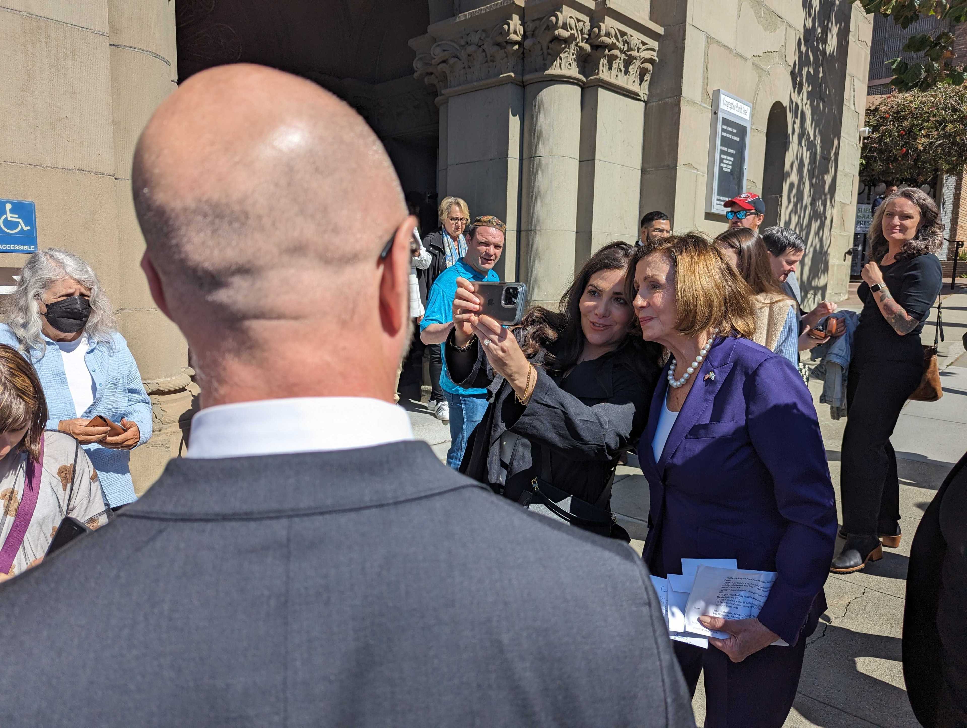 Speaker Emerita Nancy Pelosi, D-San Francisco, took a selfie Sunday outside Congregration Sherith Israel in San Francisco.