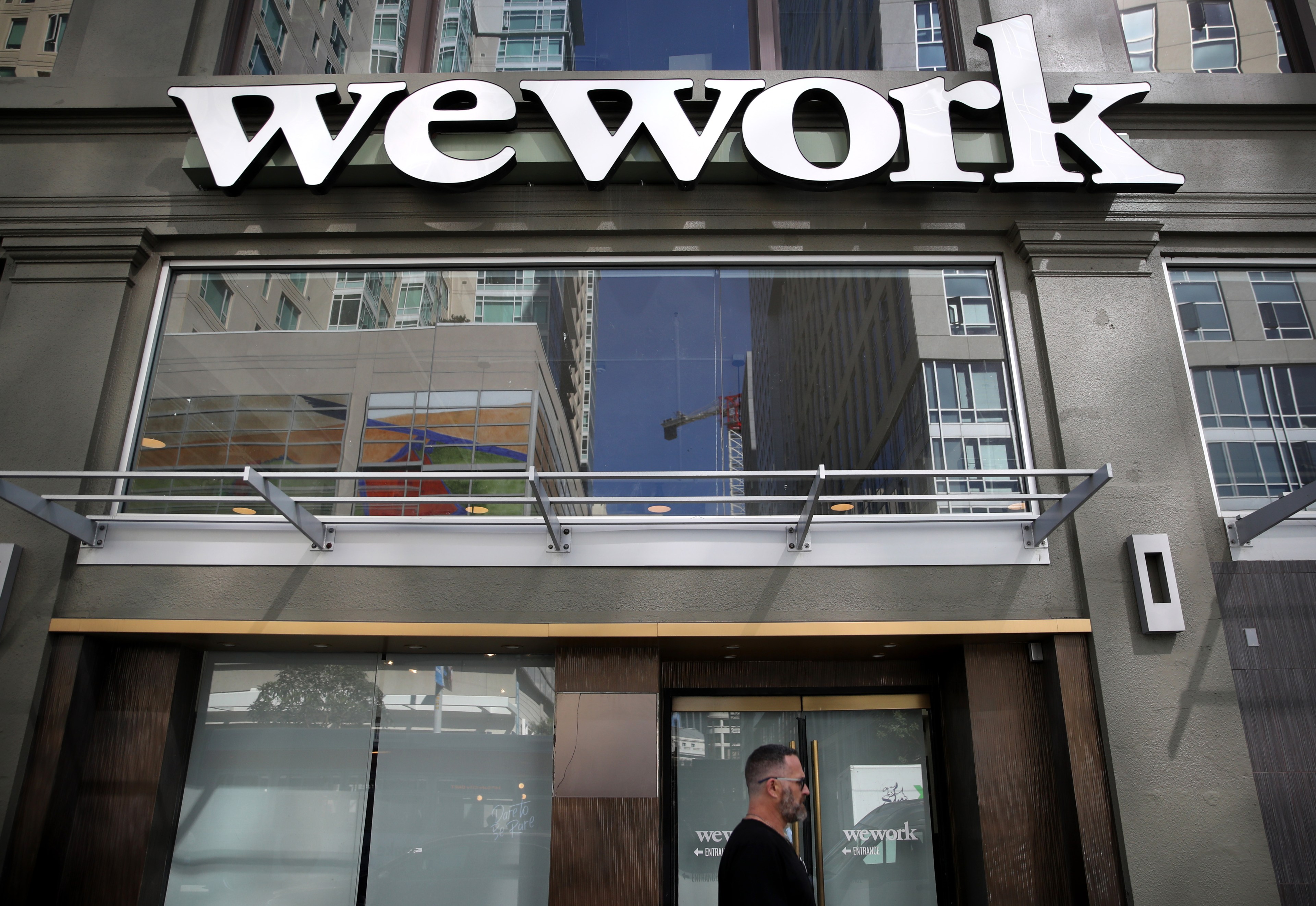 A picture of an WeWork office featuring the company's logo