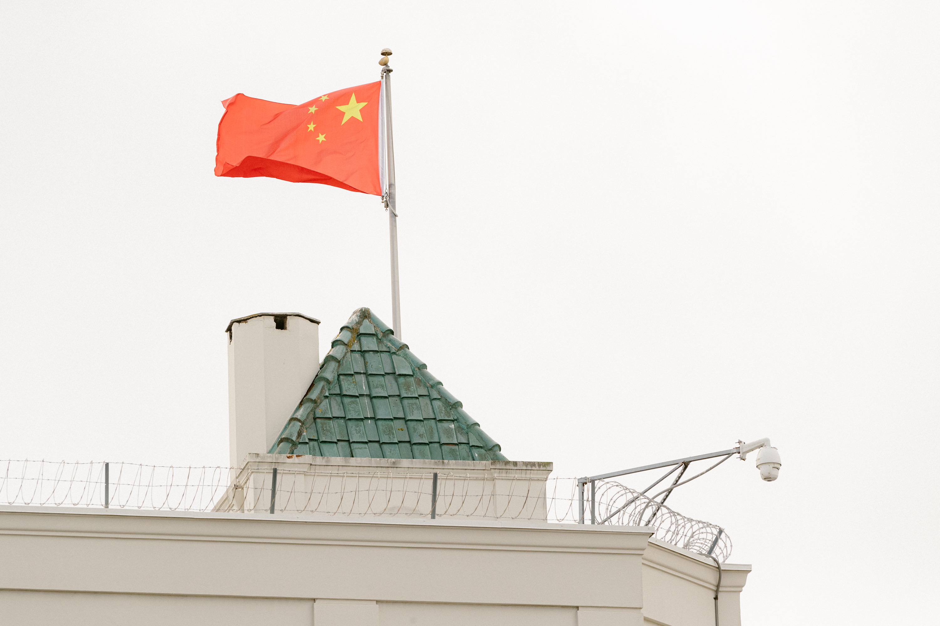 The Chinese flag at the Consulate General of The People’s Republic of China in San Francisco on Tuesday, October 10, 2023. San Francisco police on Monday shot and killed a man who a police source said was armed with a crossbow after he rammed a car into the Chinese consulate.