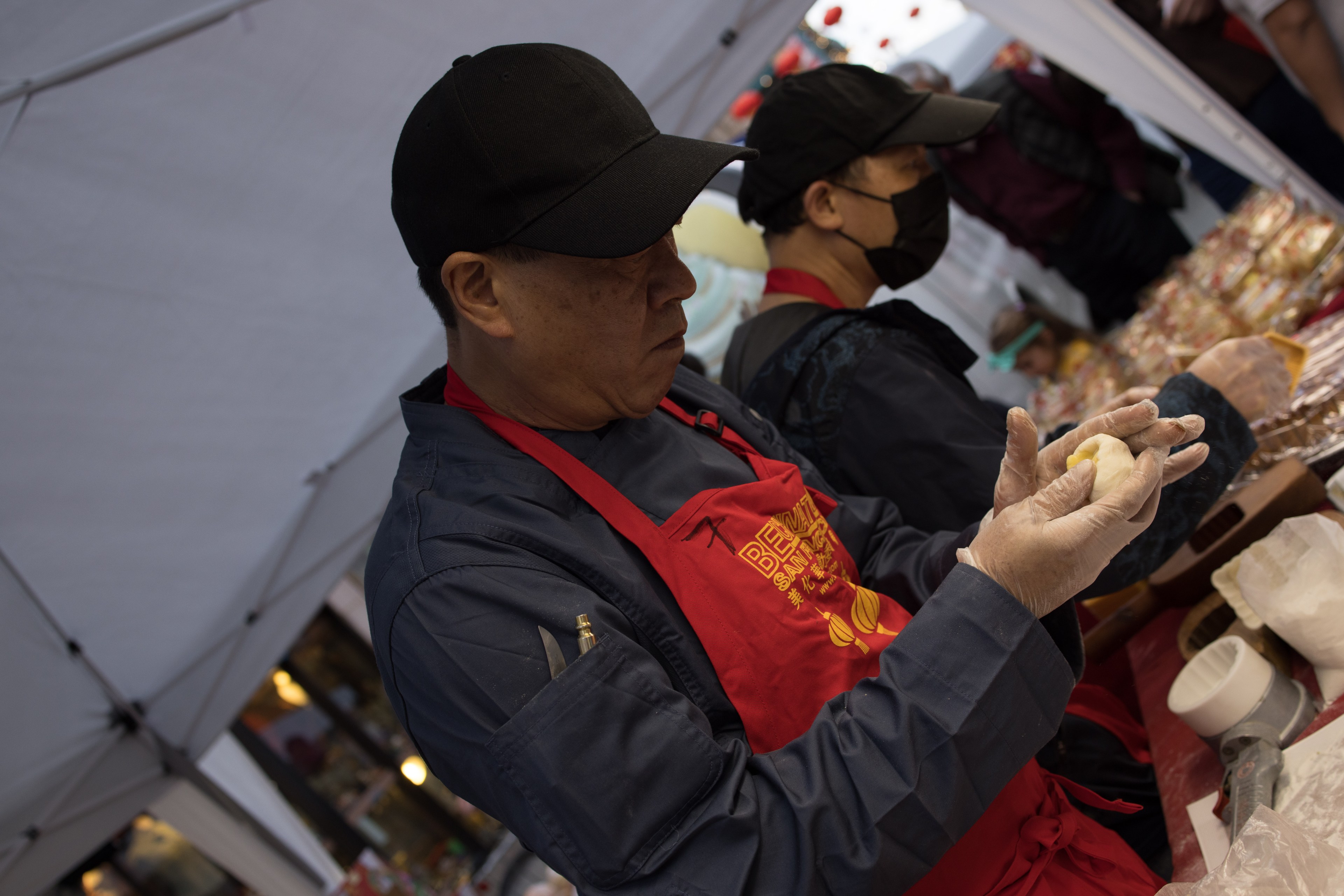 Henry Chen makes mochi dessert at the Chinatown Night Market event on September 29, 2023 in San Francisco.