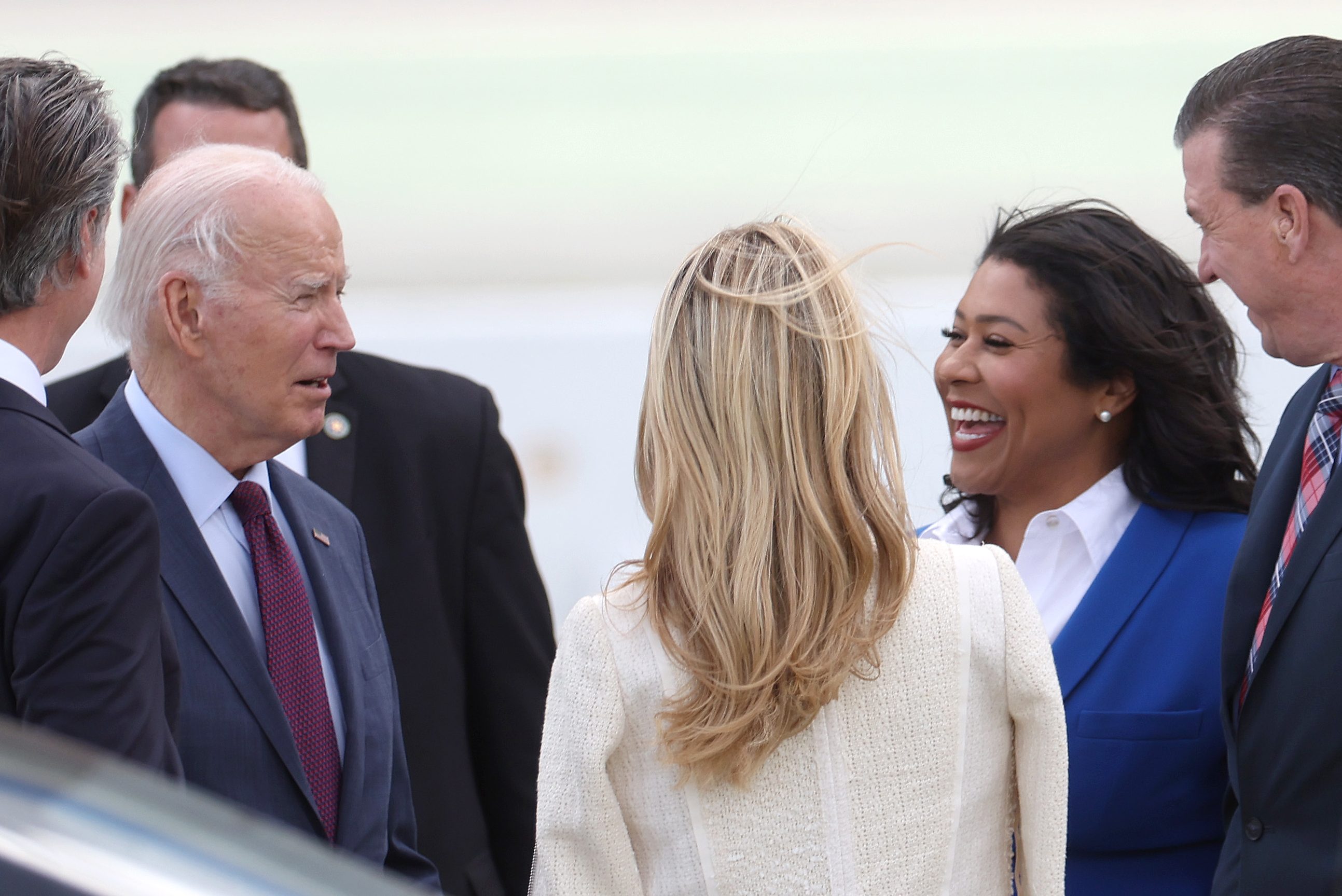 U.S. President Joe Biden greets San Francisco Mayor London Breed at San Francisco International Airport.