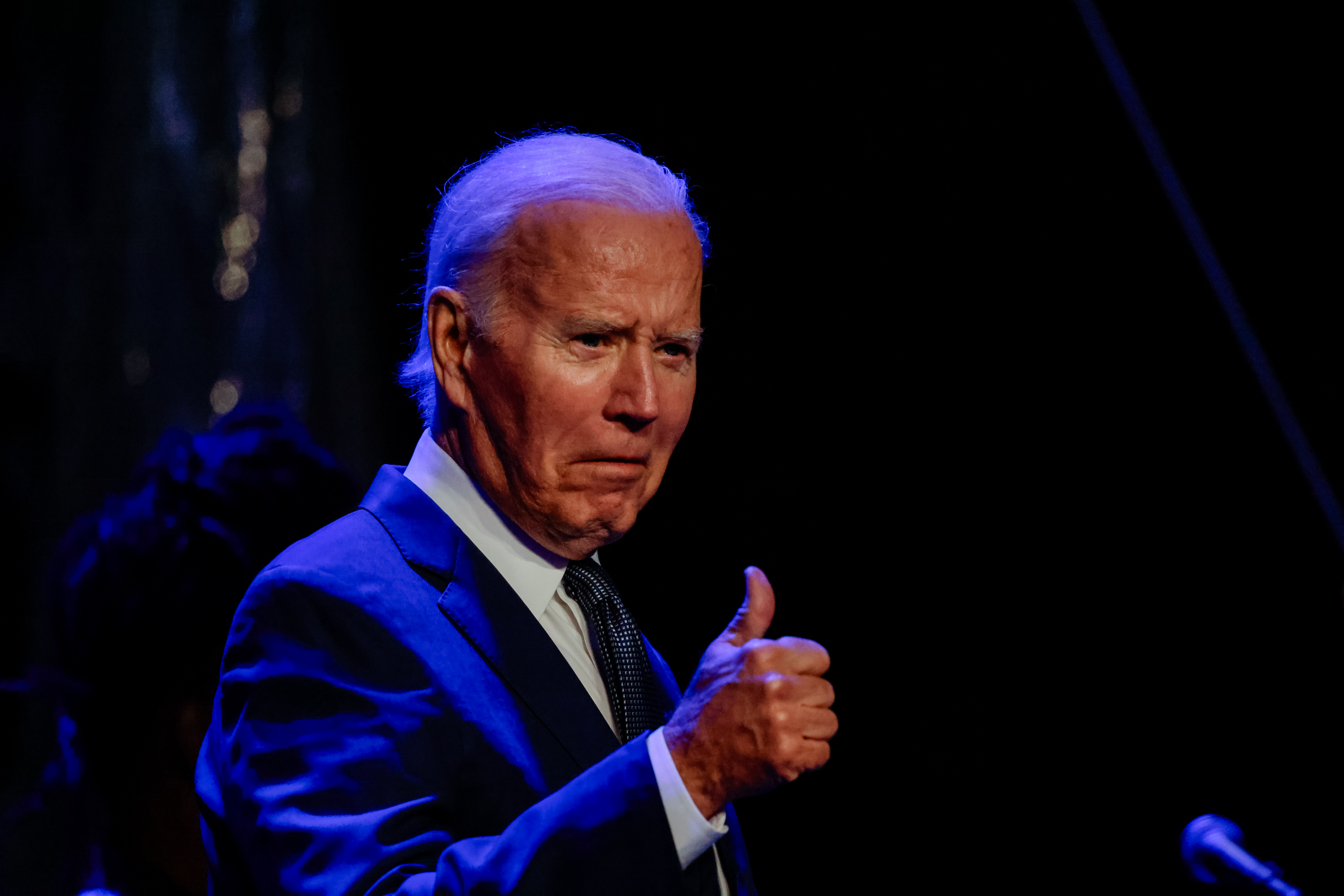 President Joe Biden gives a thumbs up.