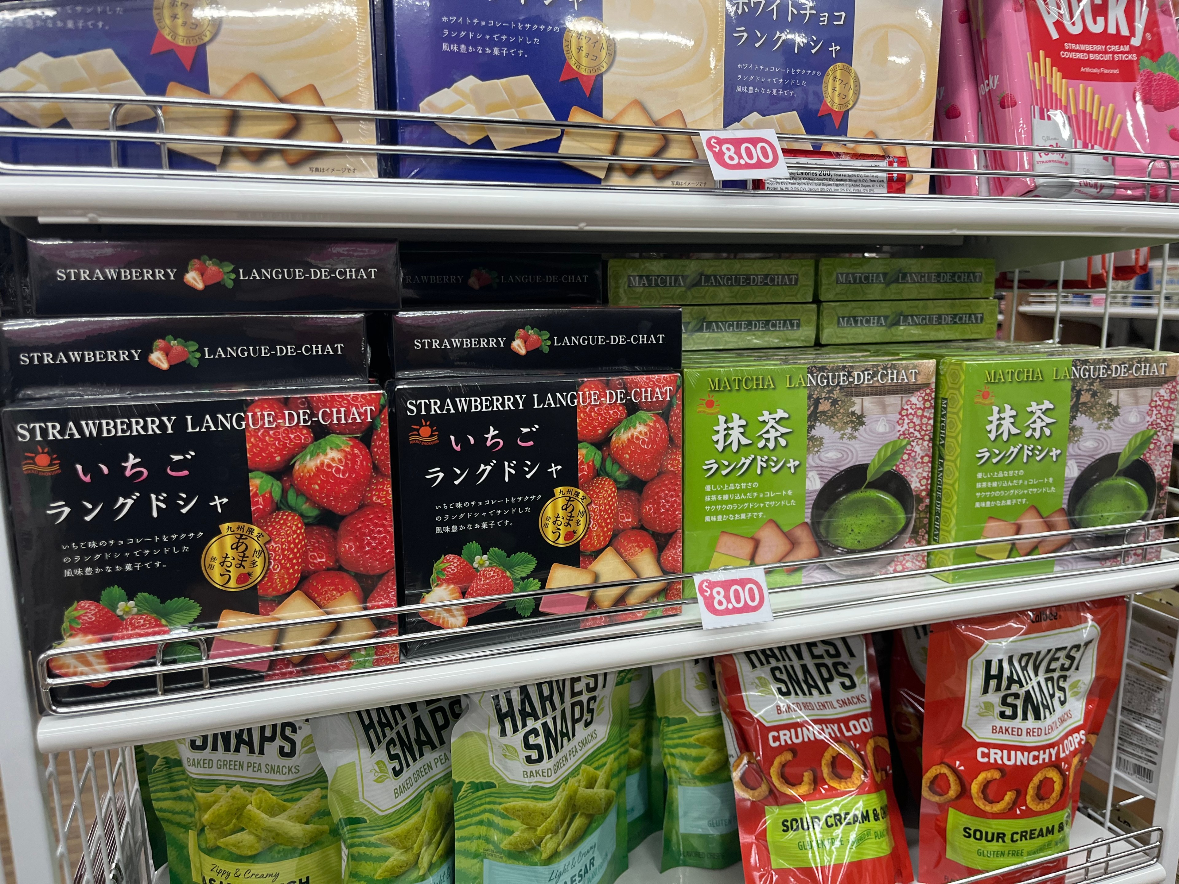 The strawberry- and matcha-flavored snacks are listed as $8 each at Daiso.