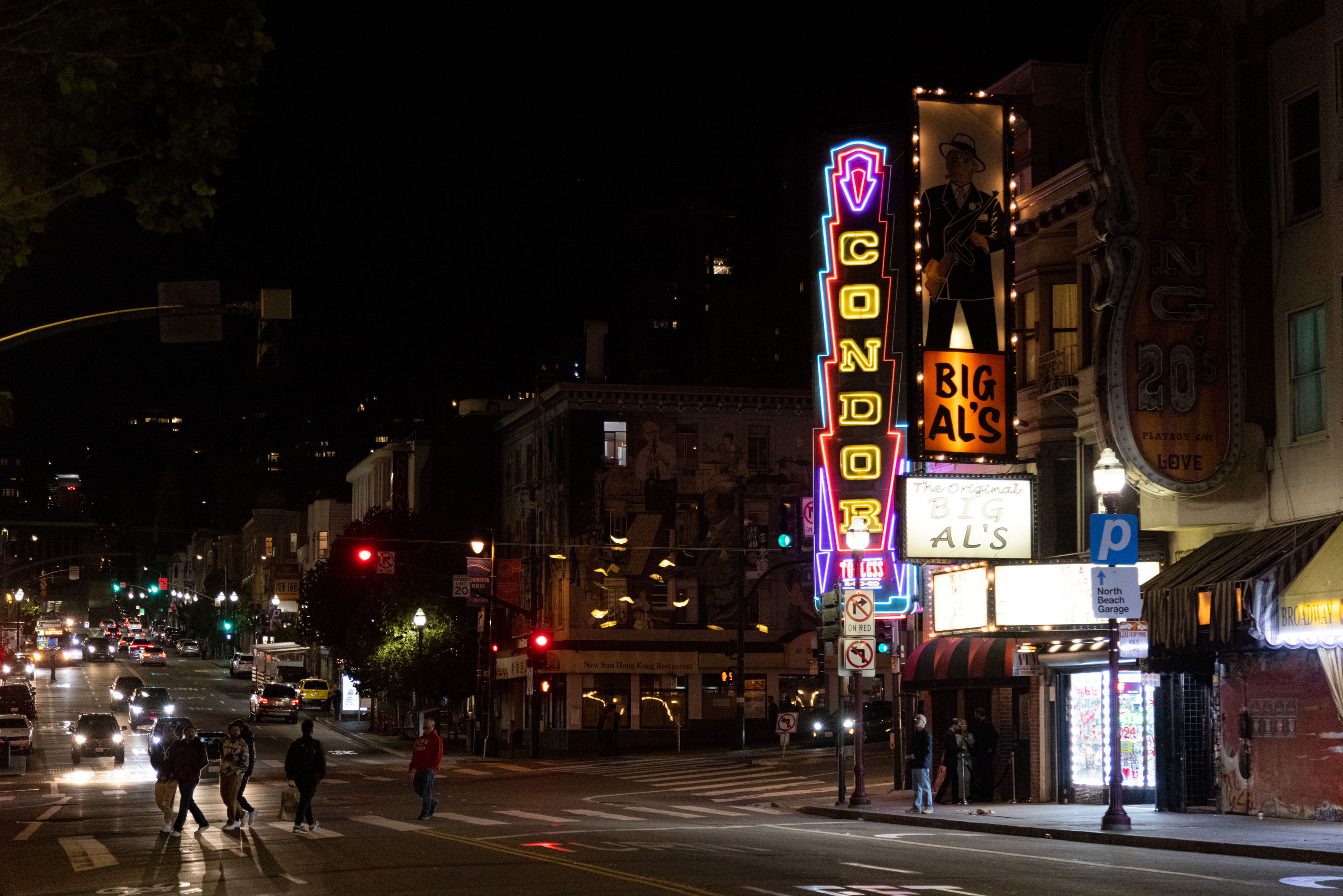 A streetview of San Francisco with the neon sign of The Condor Club in view.