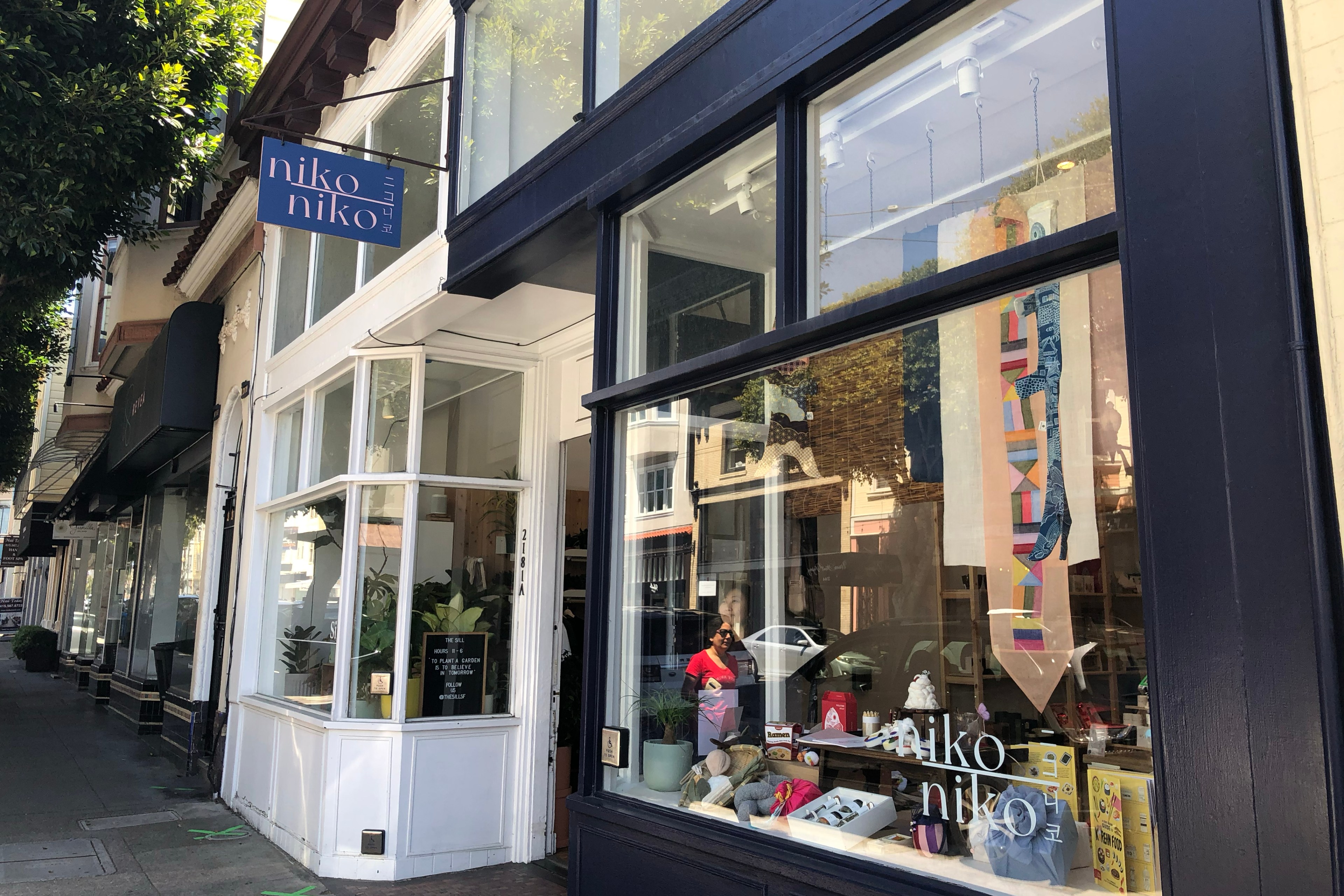 A picture of the blue storefront of Nikoniko on Union Street in San Francisco, California. 