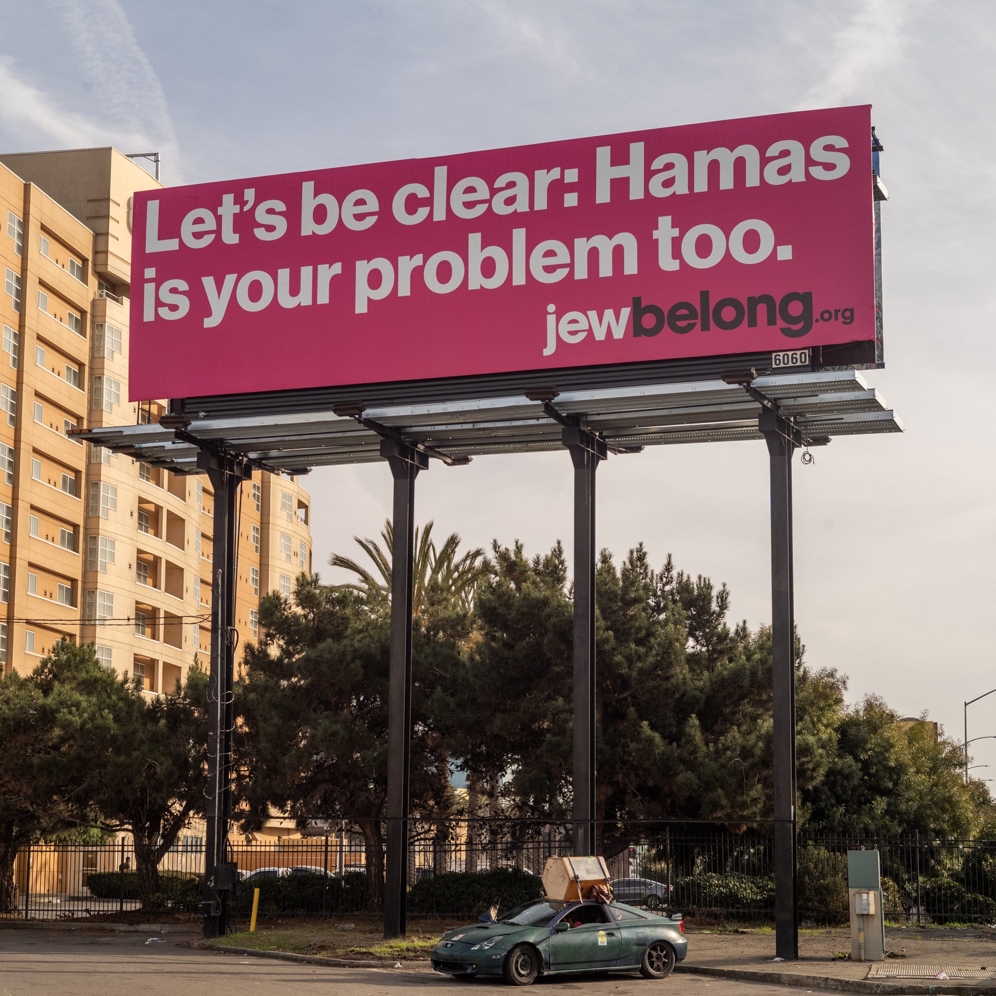 A billboard reading “Let’s be clear: Hamas is your problem too. Jewbelong.org” next to Highway 580 in Emeryville.