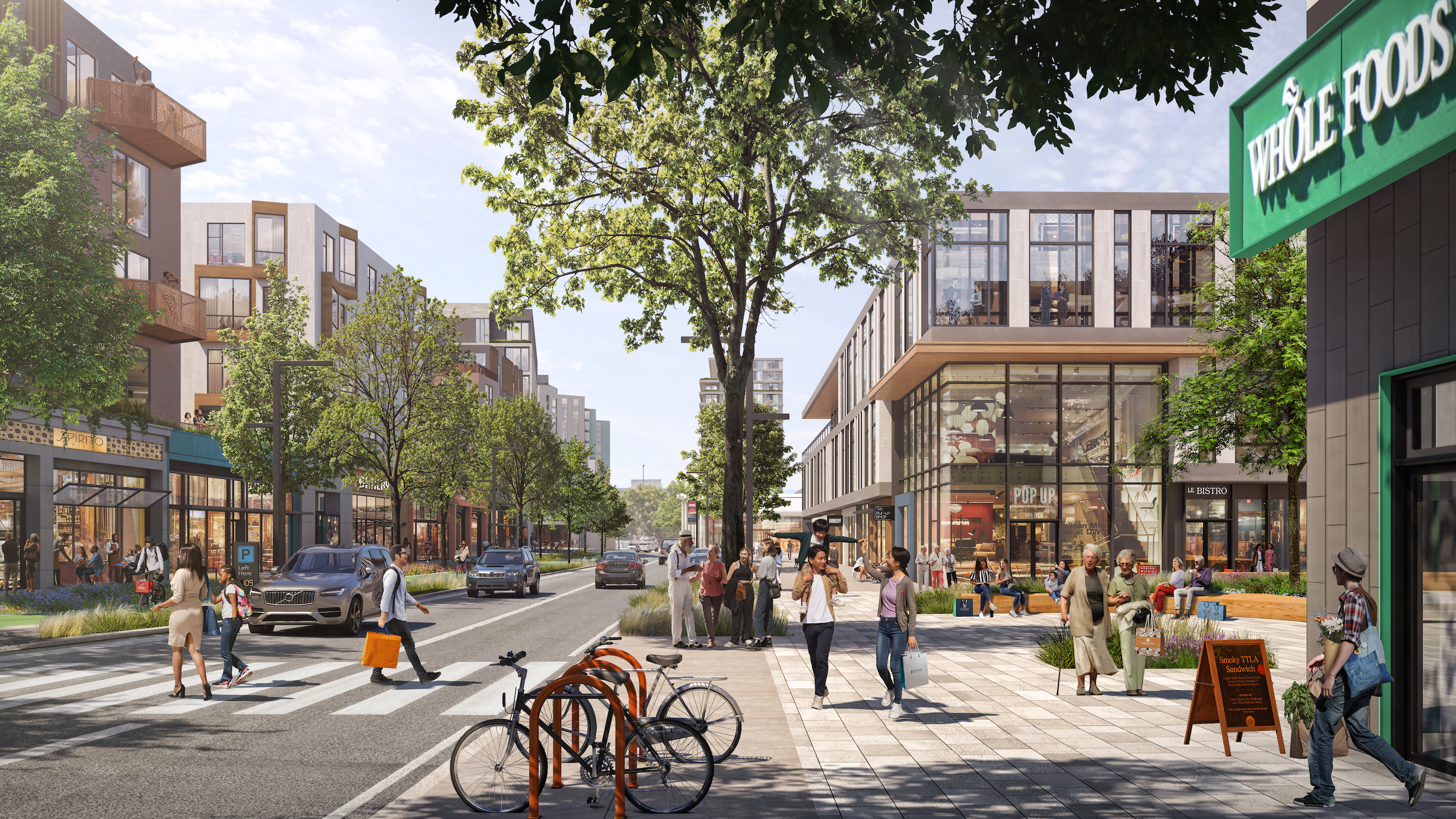 A streetscape rendering shows pedestrians at a redeveloped mall, parked bicycles and slowly cruising vehicles.