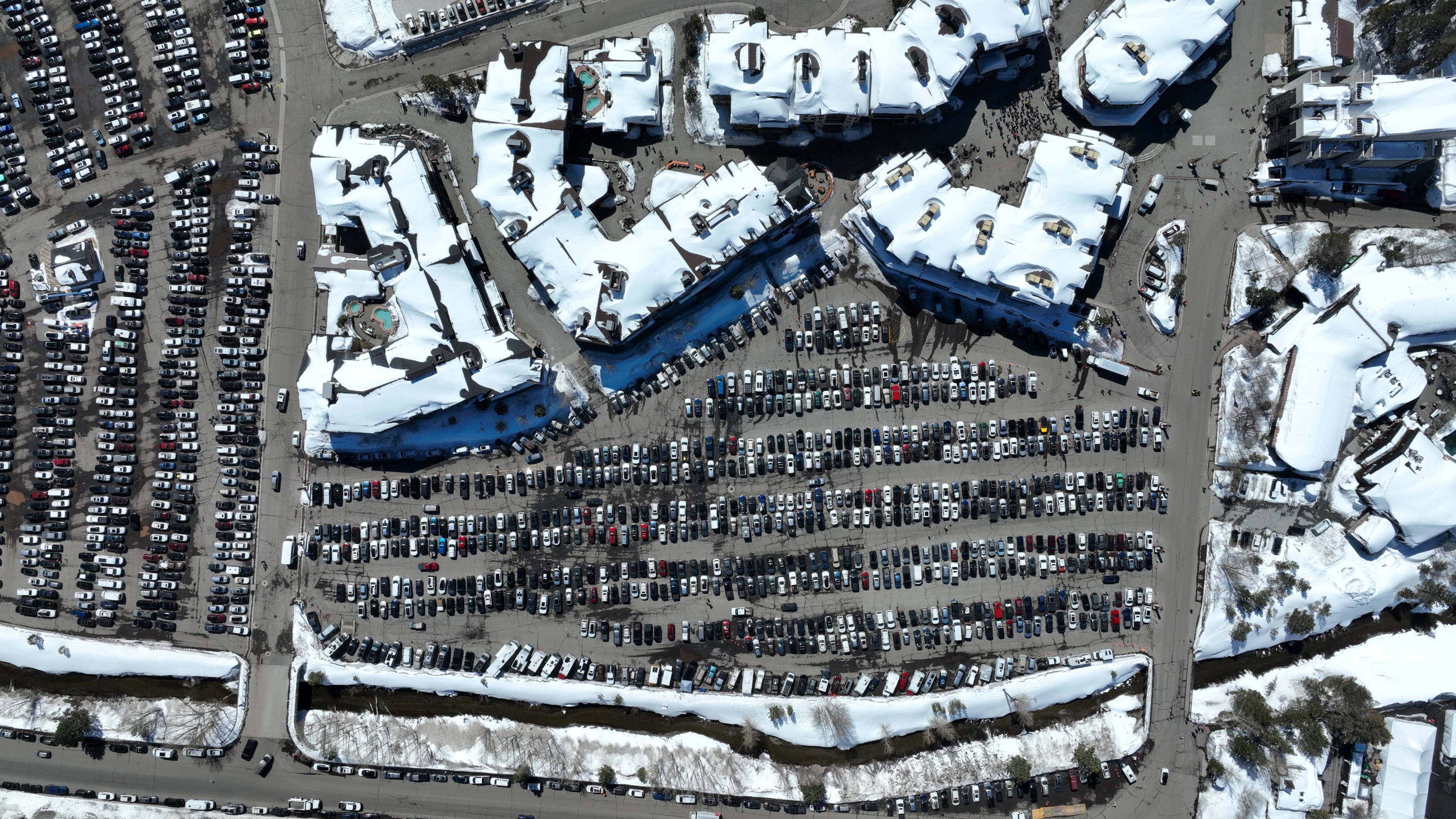 One of the Palisades Tahoe parking lots that will be requiring visitors to register for parking prior to visiting the resort. The Palisades is the largest ski resort in the Lake Tahoe area.