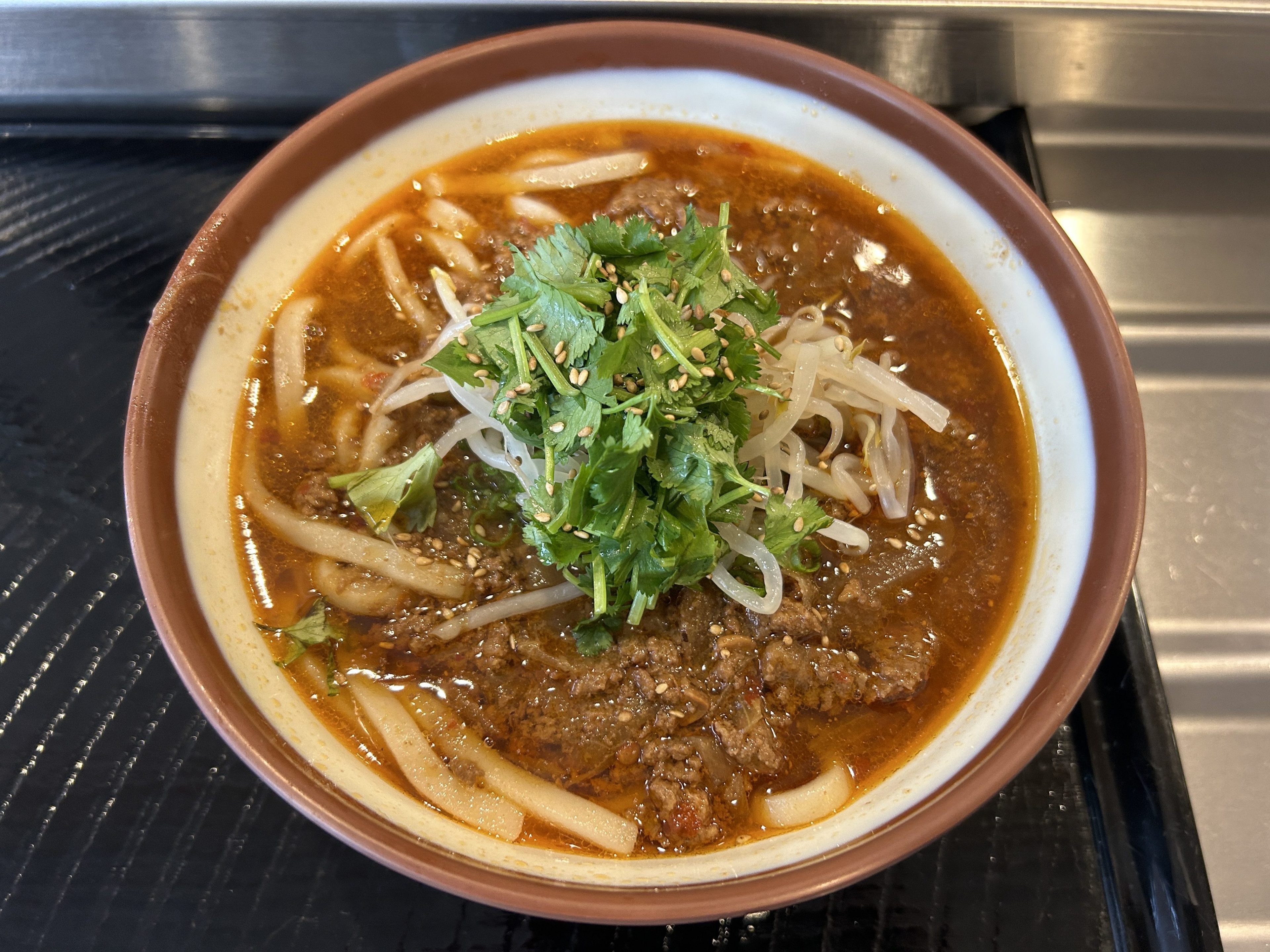 A bowl of tan tan udon made with ground beef