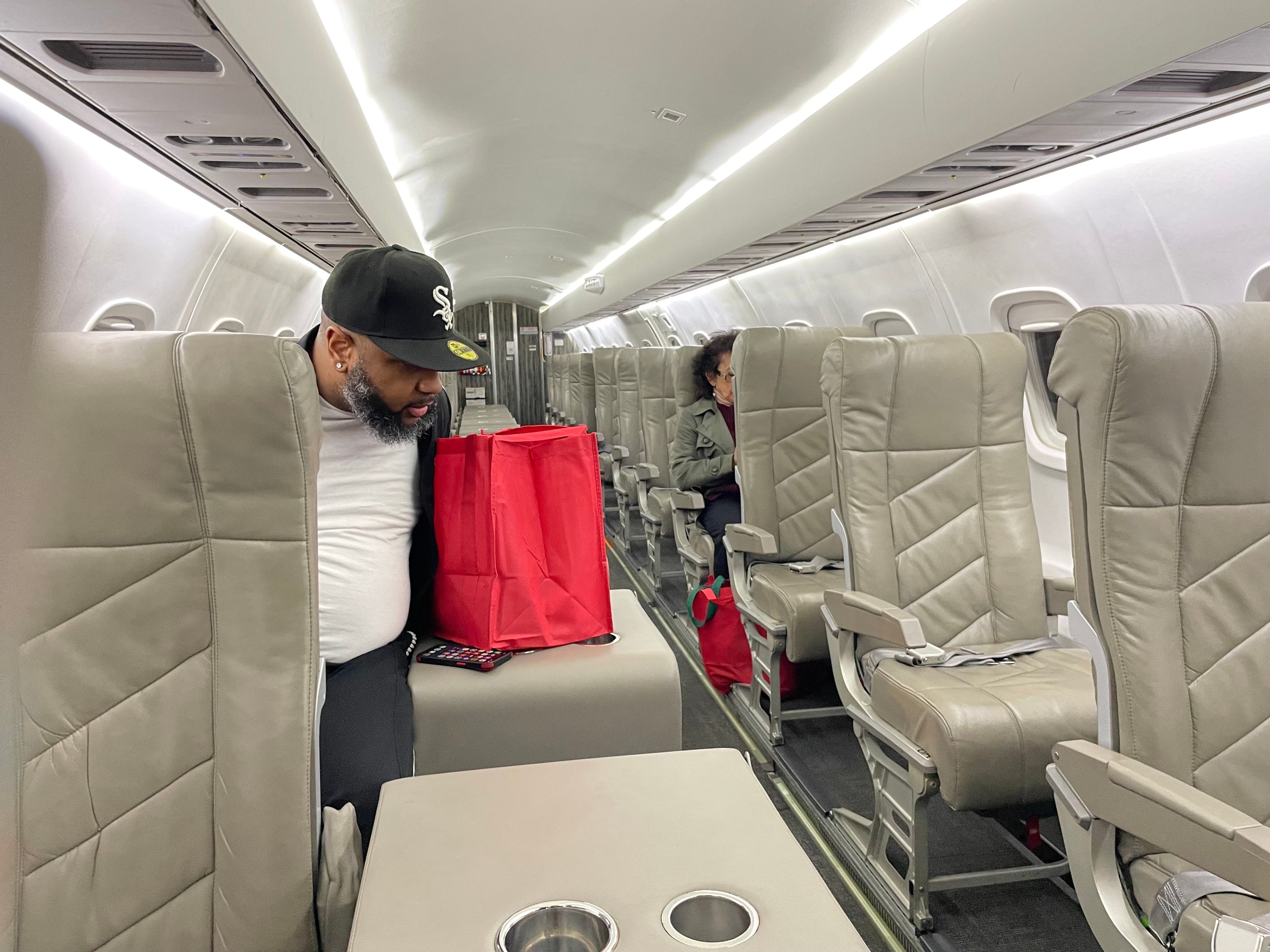chairs in single-seating seen inside a semi-private jet