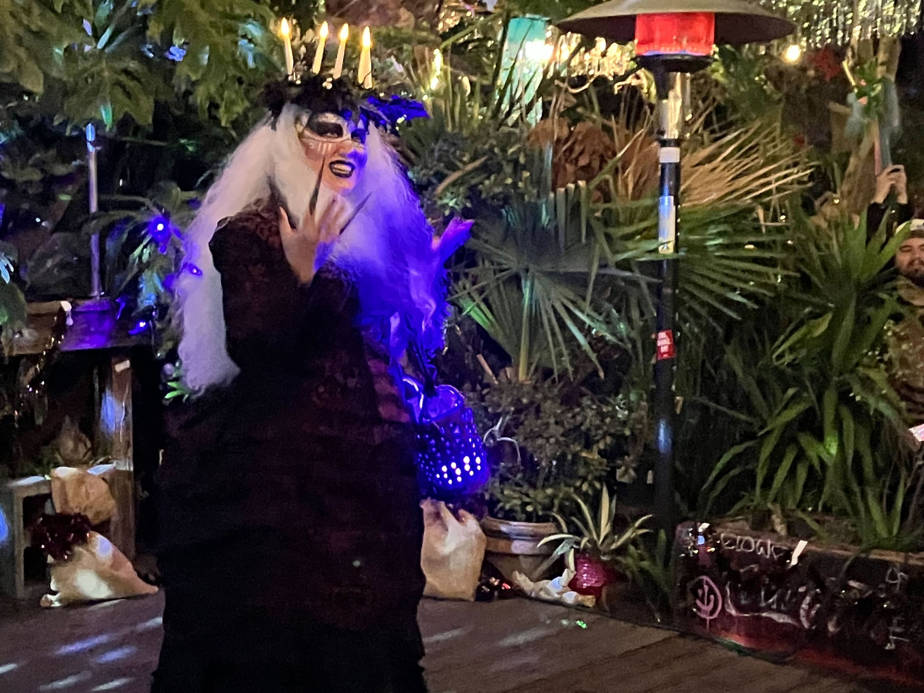 A contestant at the Krampus Costume Pageant performs a song at El Rio bar on Saturday, Dec. 2, 2023.
