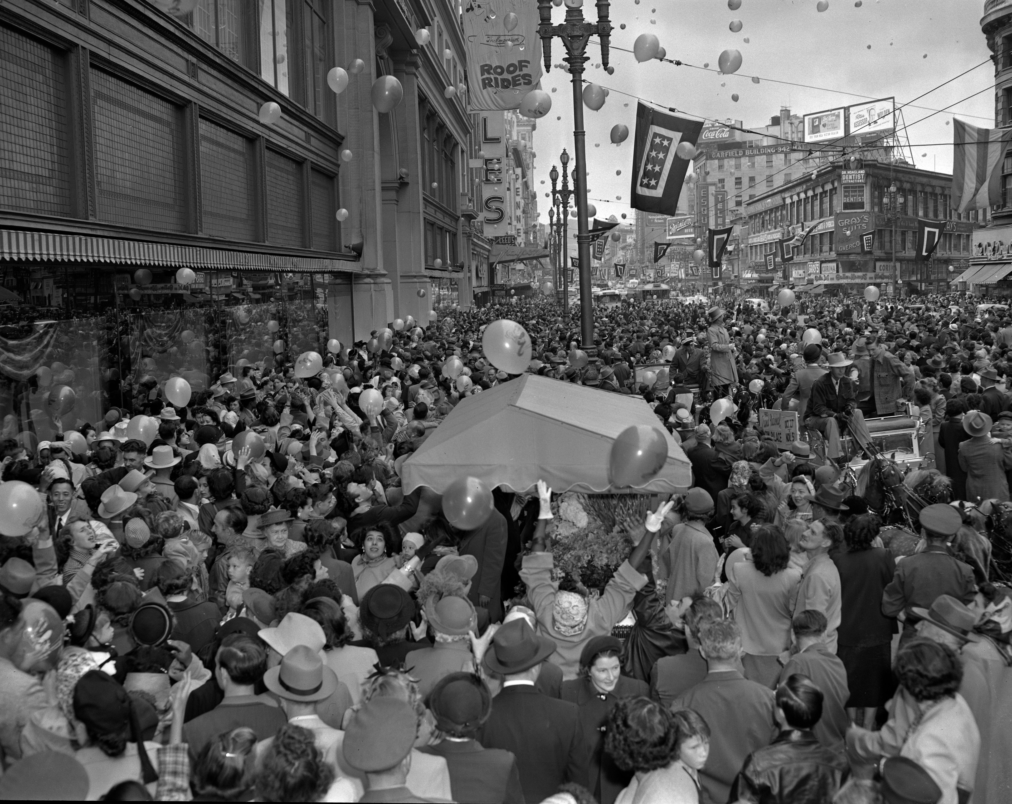Santa Claus arrives by cable car at the Emporium in downtown San Francisco on Oct. 29, 1950.