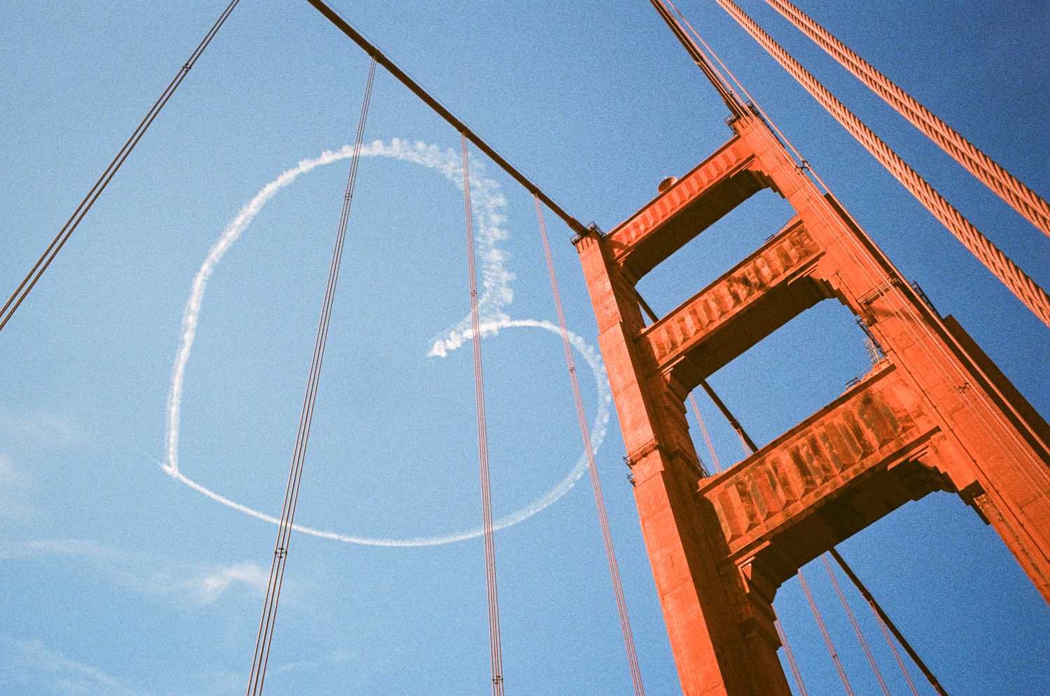 An airplane’s contrails create the shape of a heart over the Golden Gate Bridge in San Francisco in October 2019.