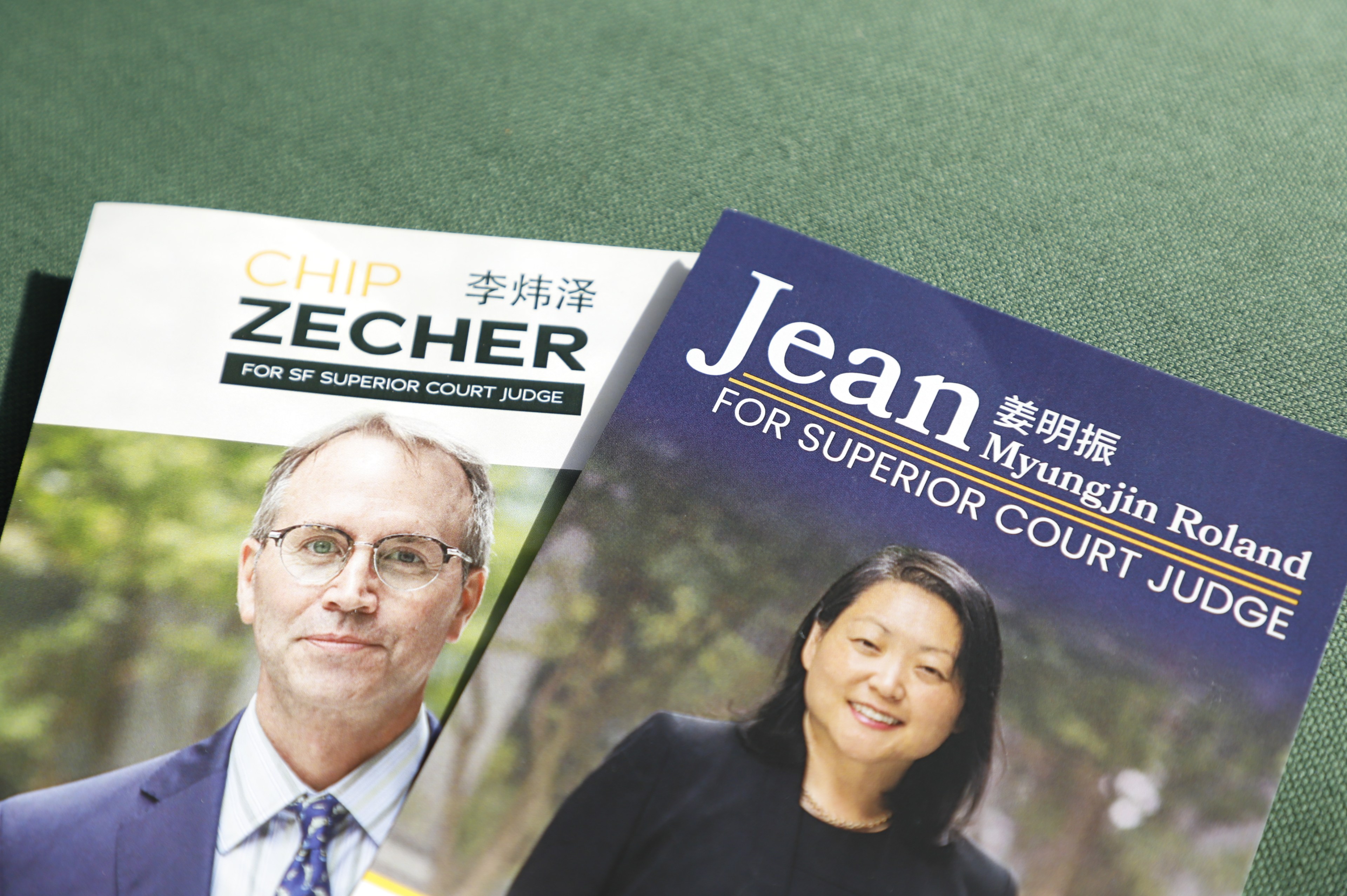 Campaign flyers for SF Superior Court judge candidates Chip Zecher, left, and Jean Myungin Roland have Chinese names next to their English names which has created some controversy.