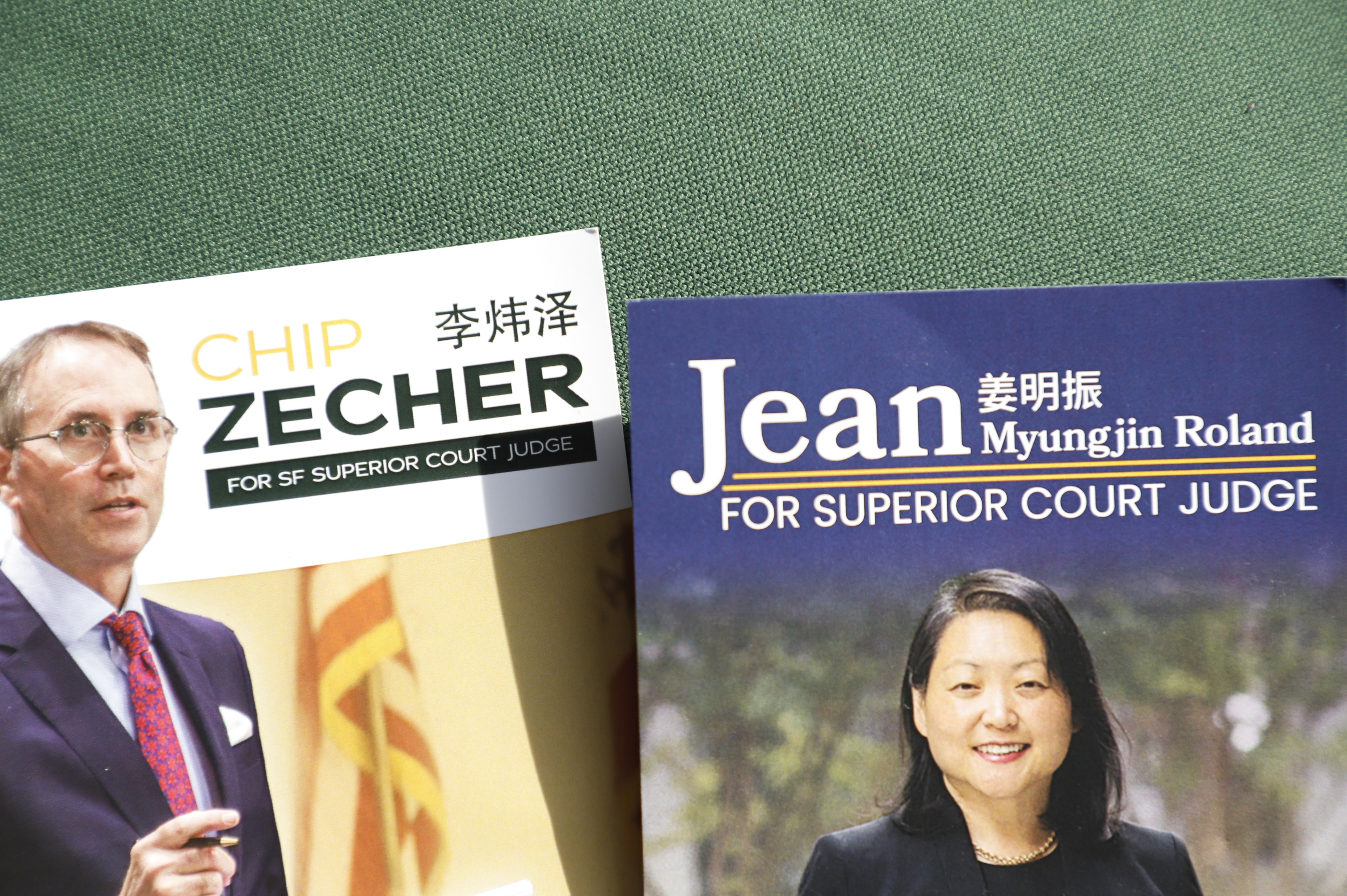 Two campaign flyers with a man and a woman on them. 