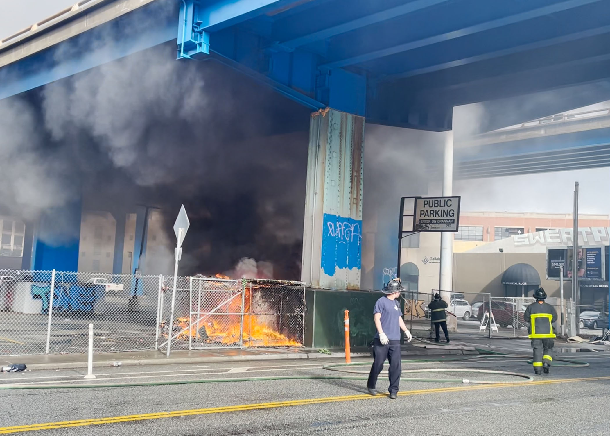 SFPD responds to the fire underneath the Central Freeway on December 19, 2023.