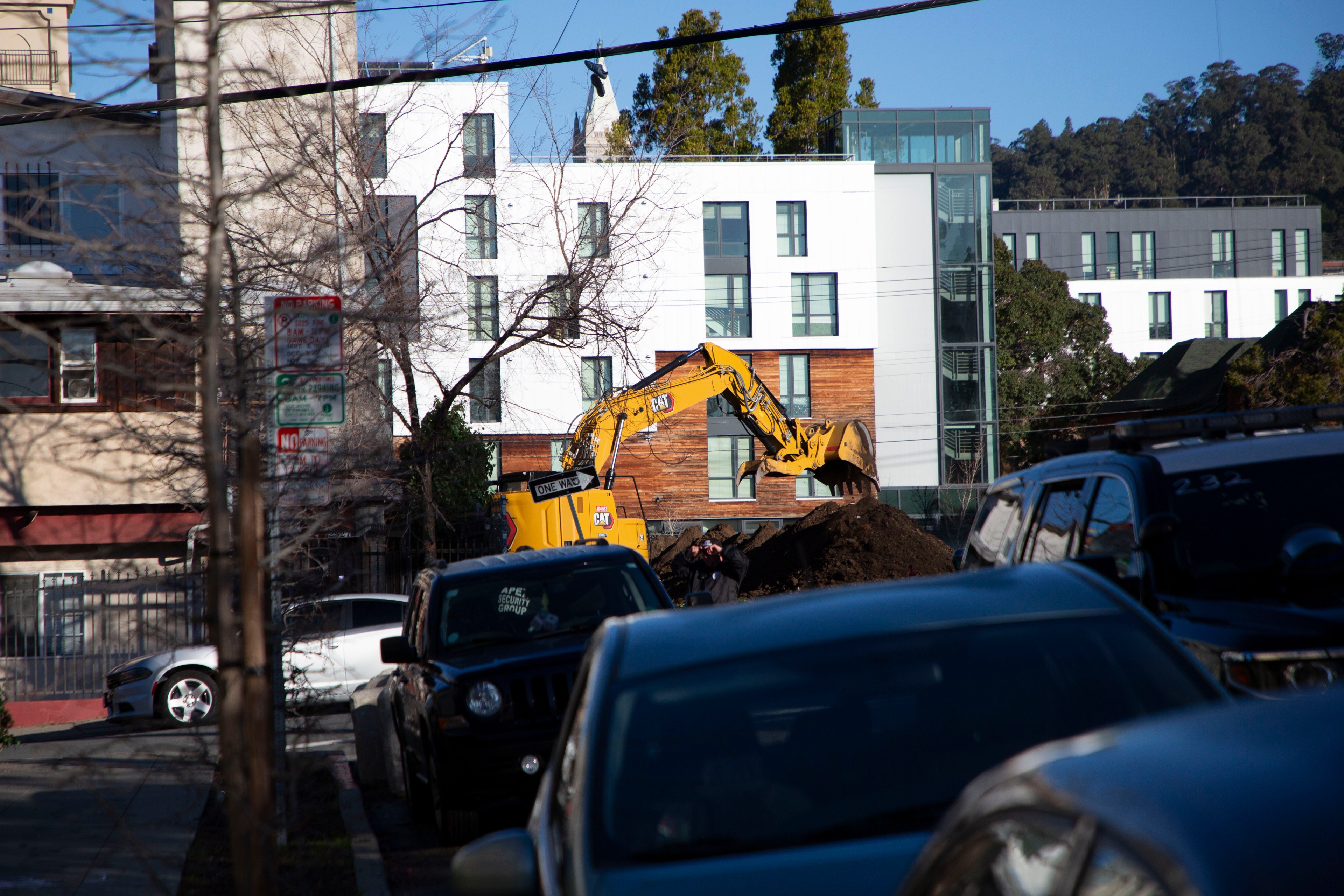An excavator can be seen in the distance as it begins construction at the Peoples Park.