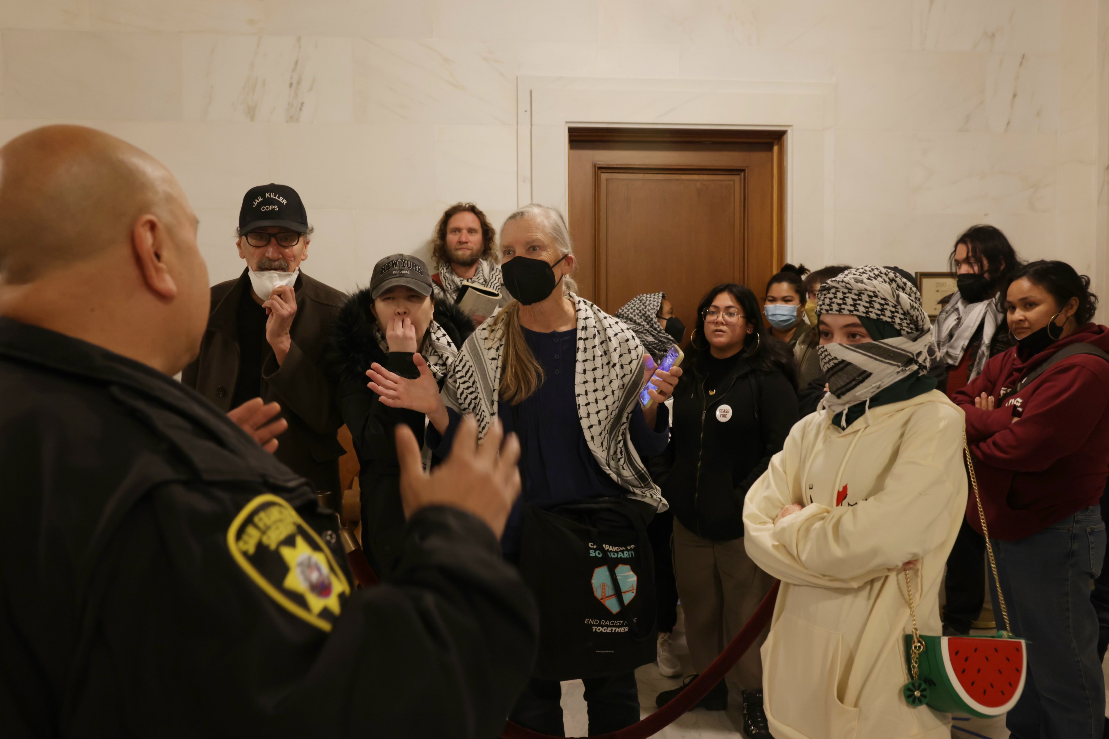 Scores of activists packed City Hall Monday to push San Francisco lawmakers to pass a resolution calling for a cease-fire in Gaza.