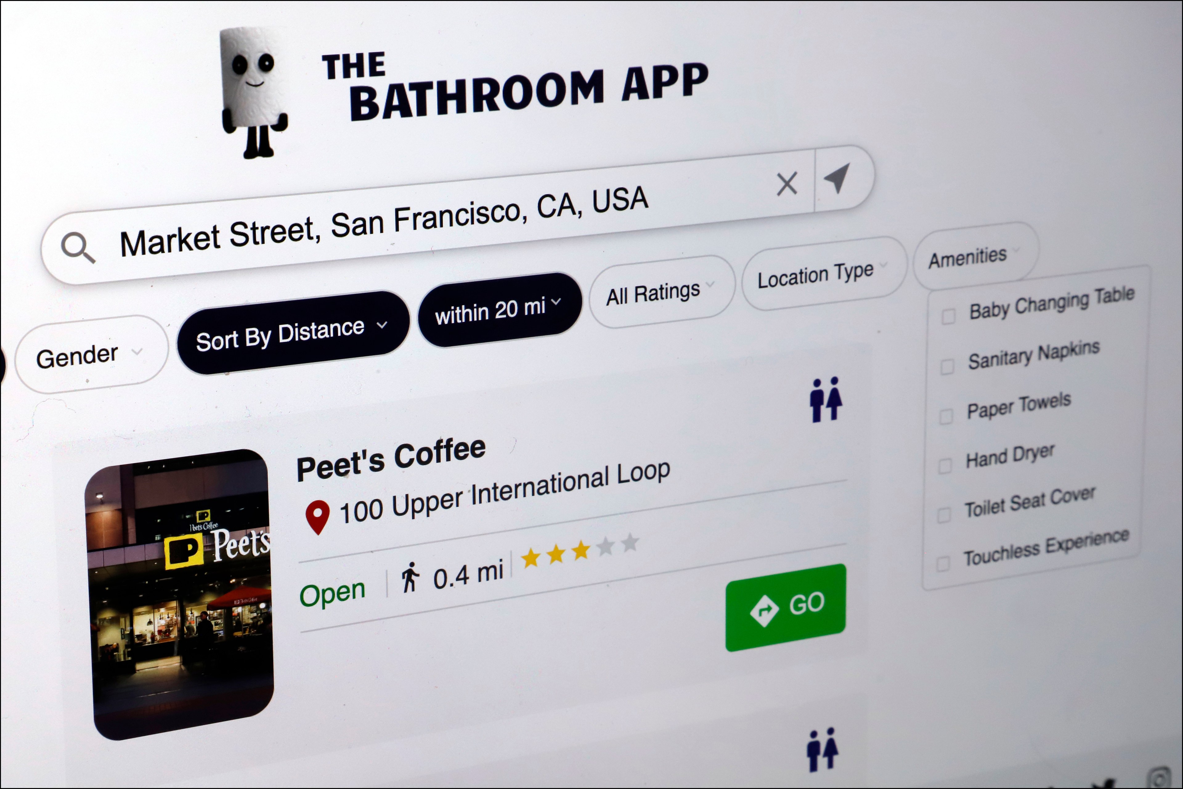 A close-up shot shows a bathroom locator app on a computer screen.