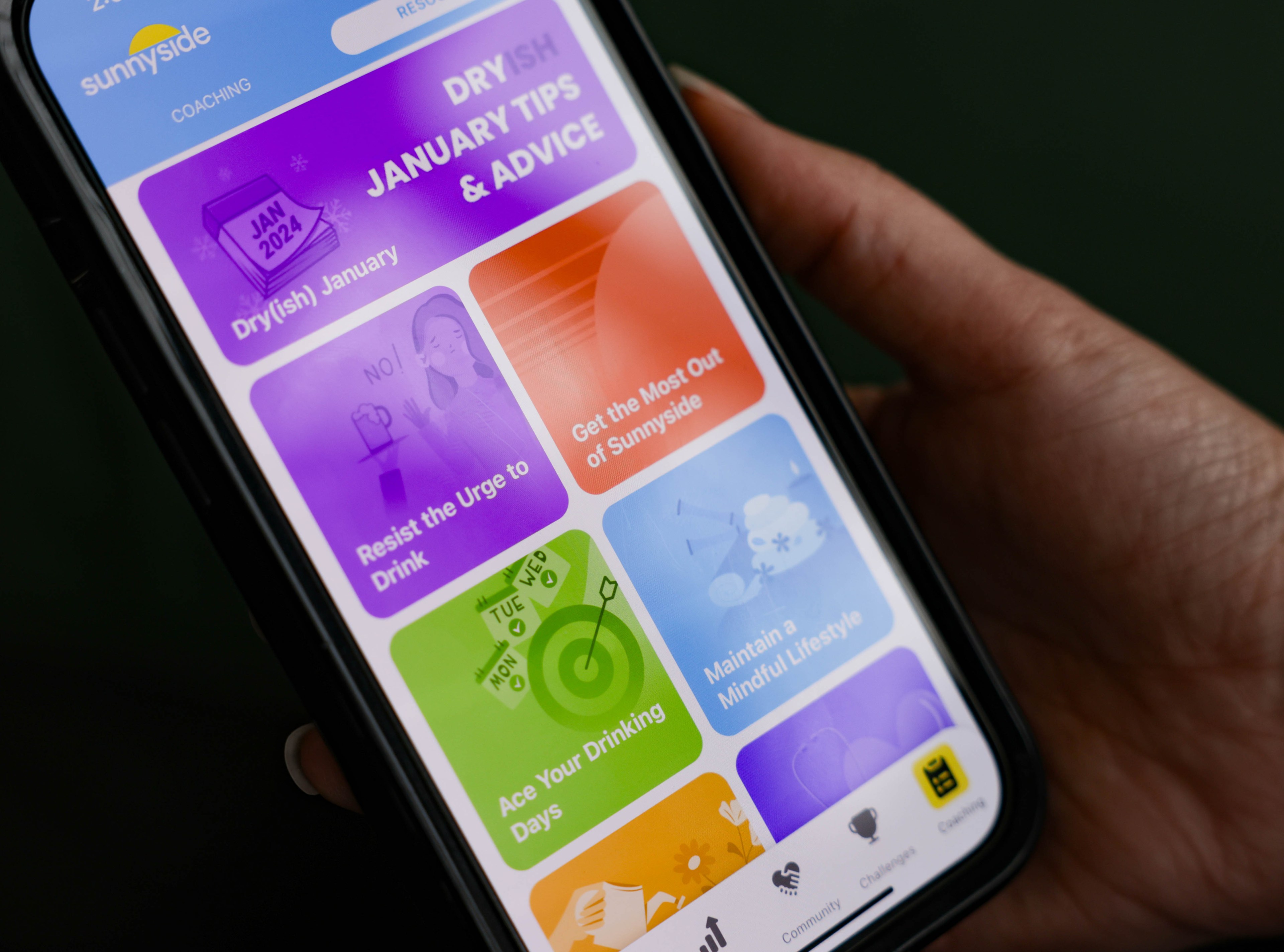 A close up of a colorful dashboard on Sunnyside &quot;mindful&quot; drinking app, which has tools and educational resources for people to try &quot;Dry-ish&quot; January.  