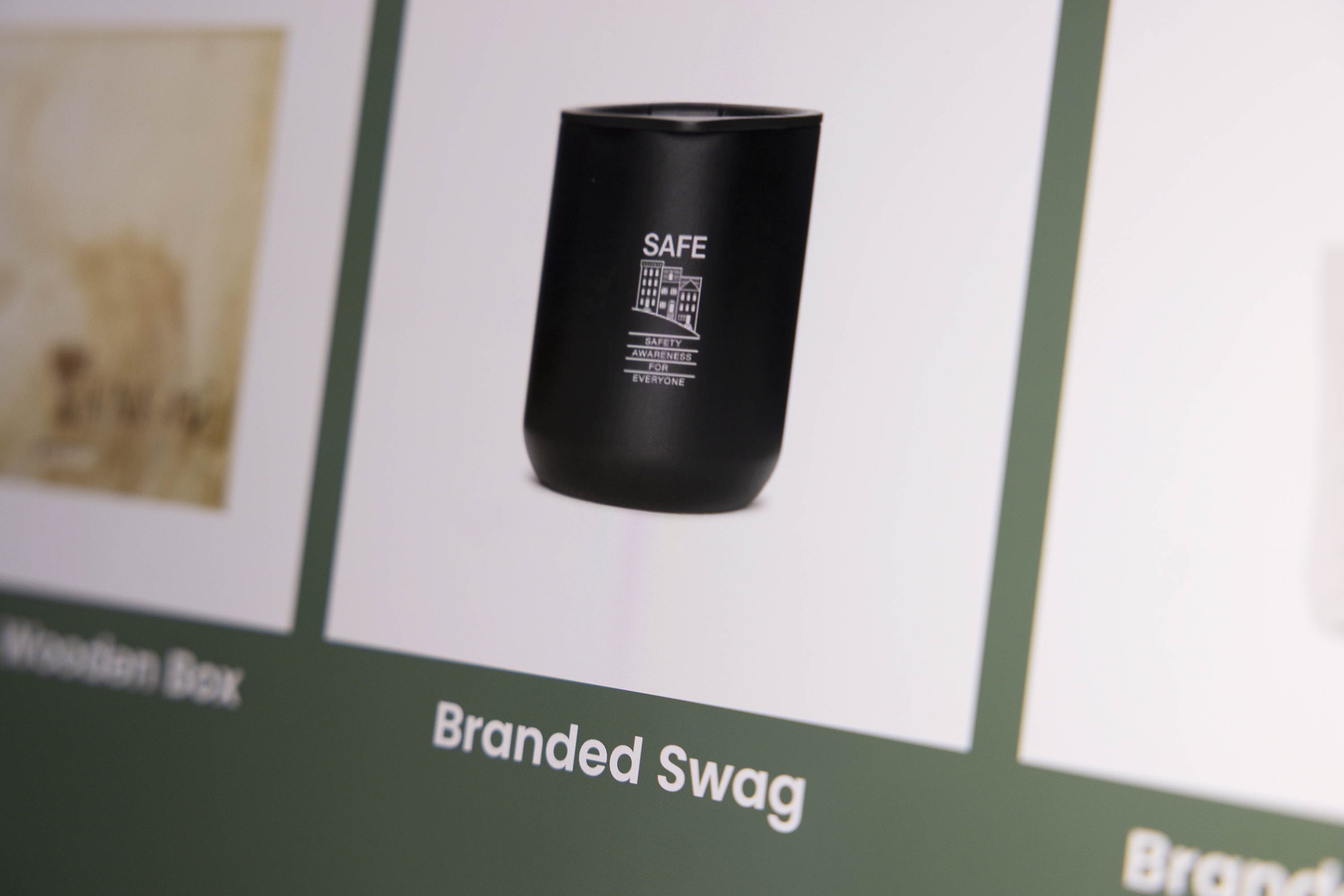 A mug has the SF SAFE logo on it, listed on a website.