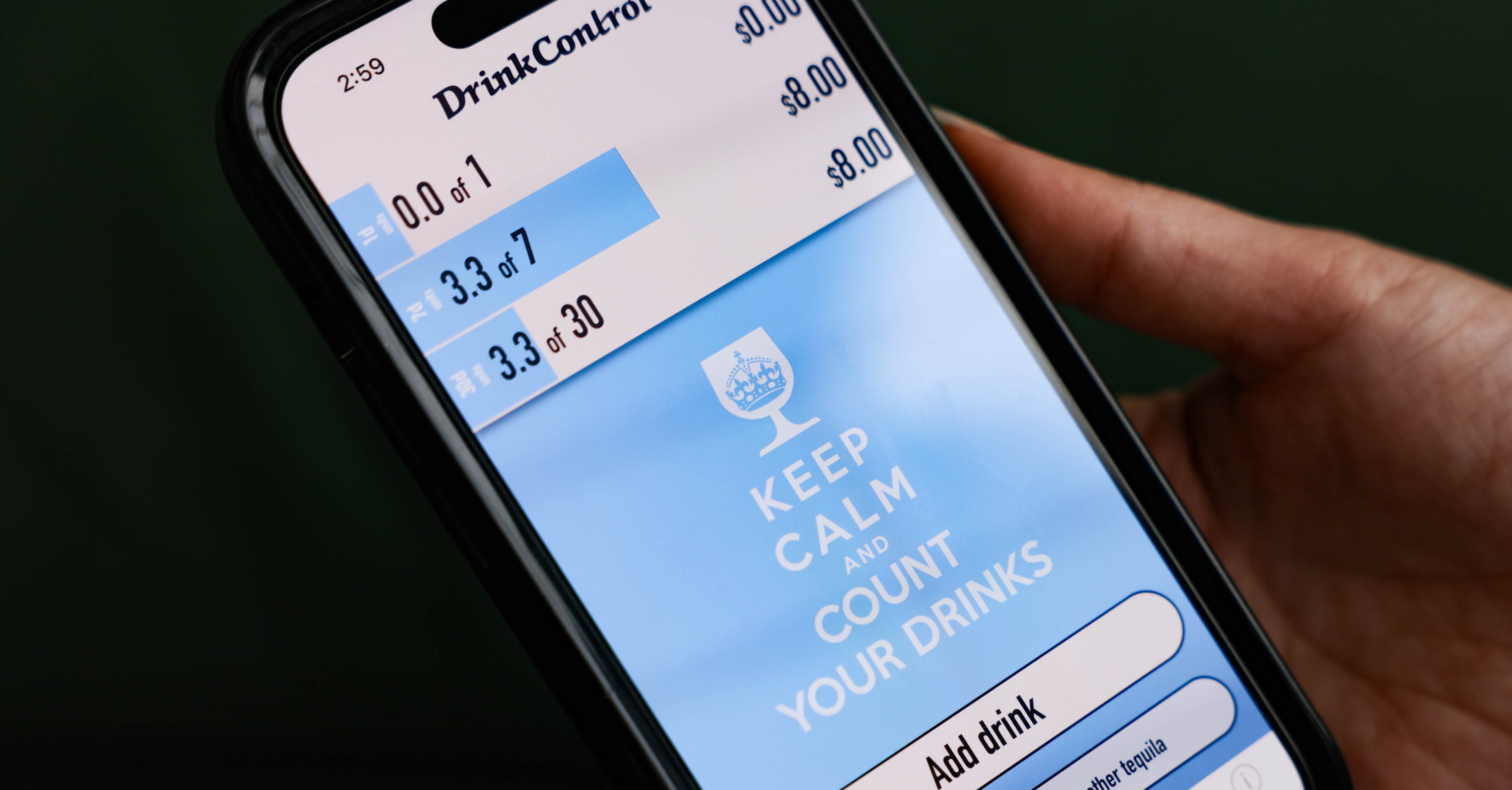 A close up of the DrinkControl on a mobile phone, which helps users track their alcohol intake with color-coded bars and motivating slogans.