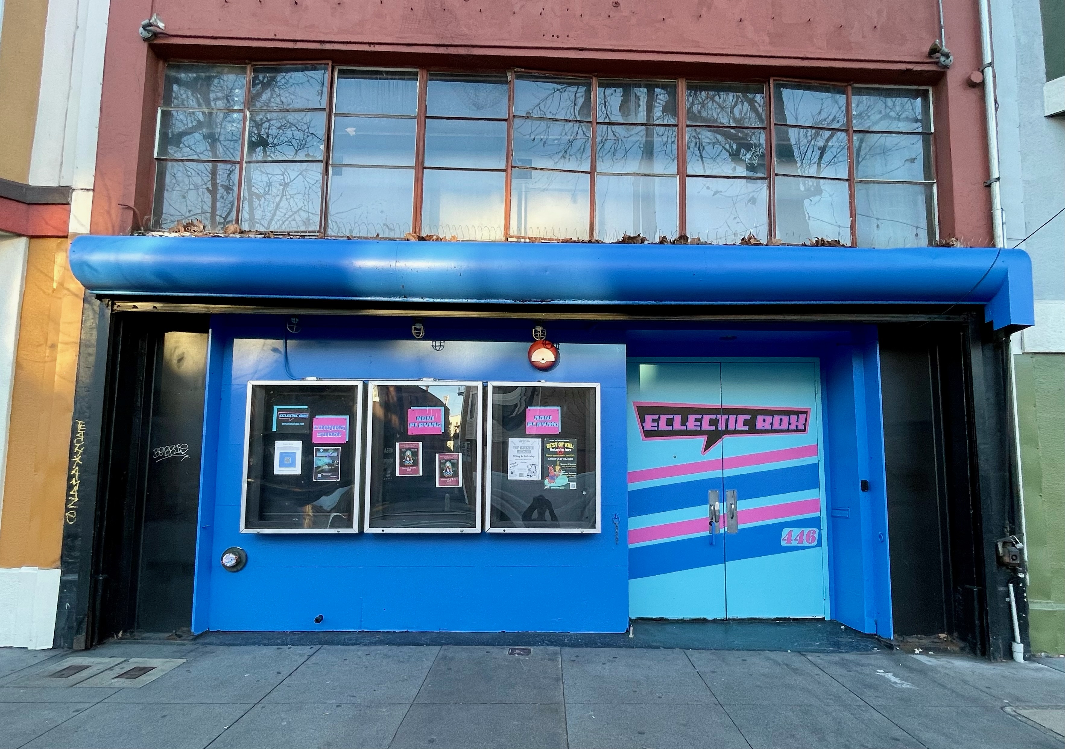 Eclectic Box theater in San Francisco's Mission District has an electric blue and pink facade. 