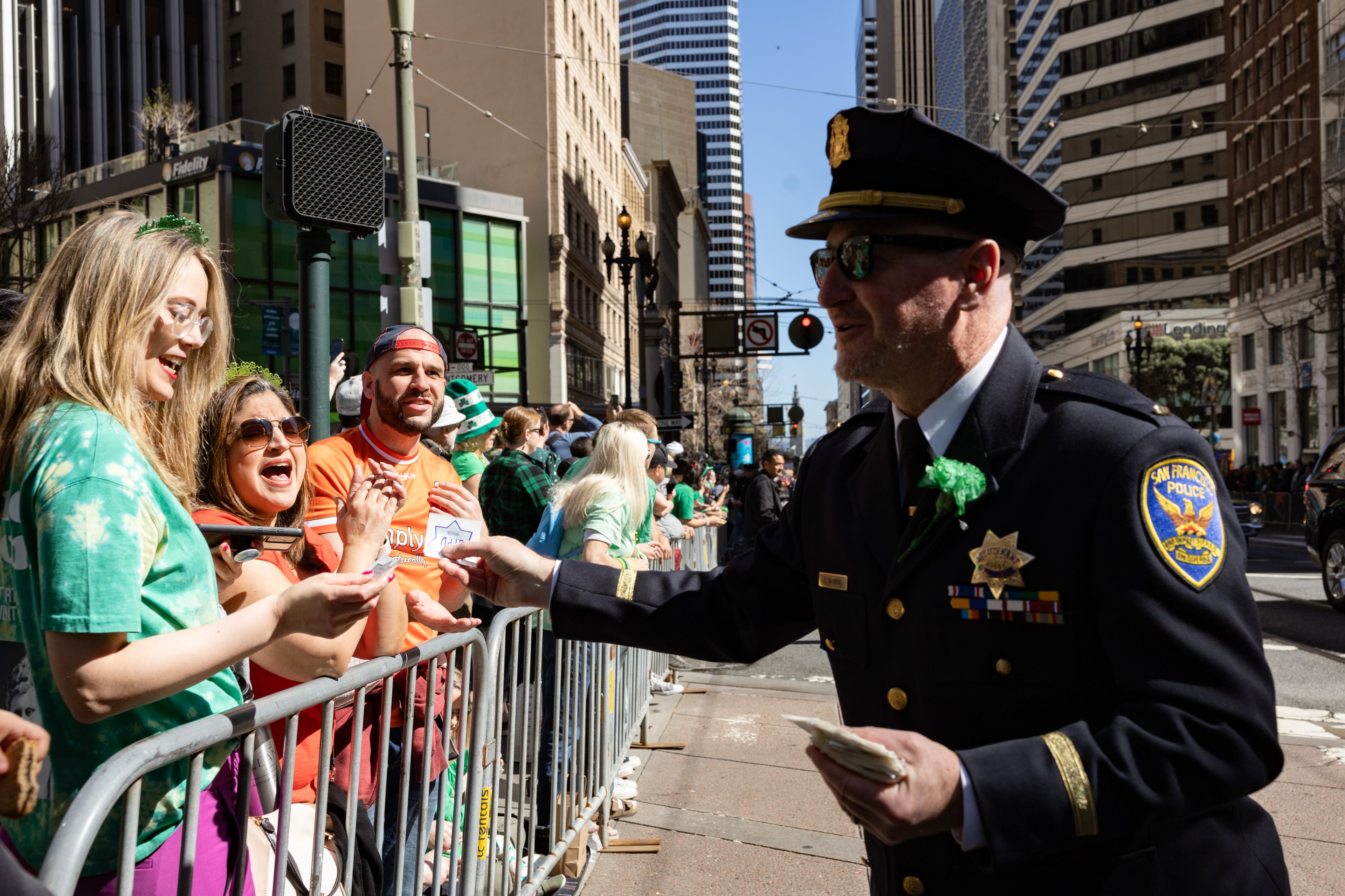 Police and spectators at San Francisco's St. Patrick's Day parade
