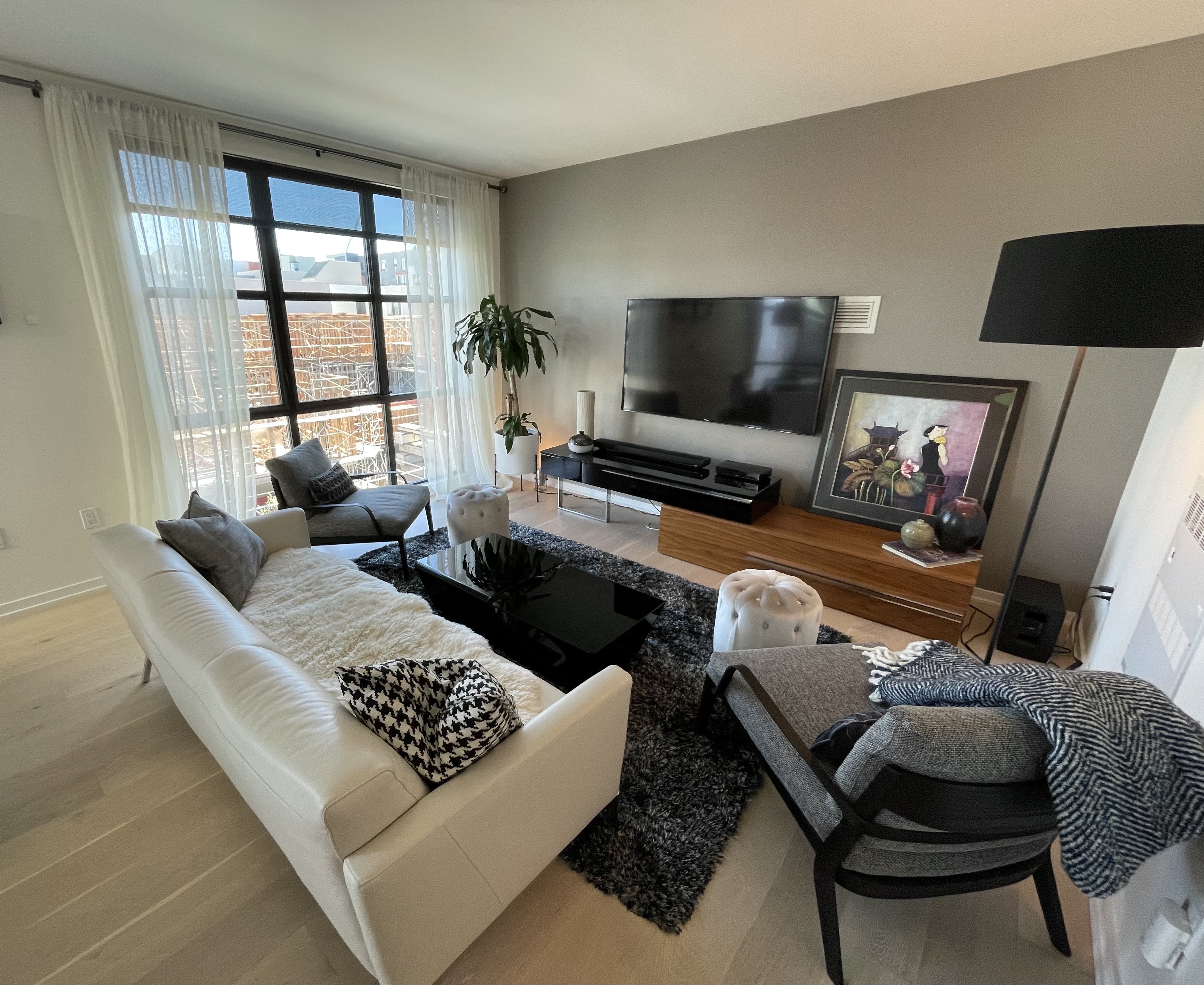 The staged interior of a San Francisco condo listed for sale is seen in a photo.